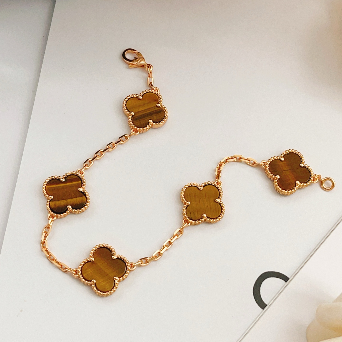 Van Cleef Arpels Vintage Alhambra bracelet Rose gold with brown tiger s eye stone inlays 18cm