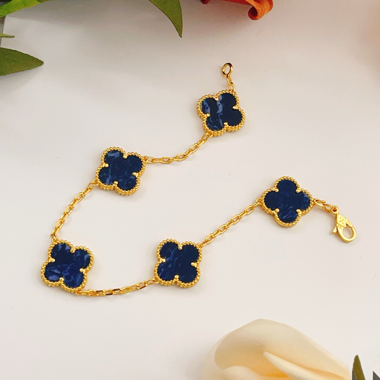 Van Cleef Arpels Alhambra bracelet Yellow gold with dark blue pietersite stone inlays 18cm