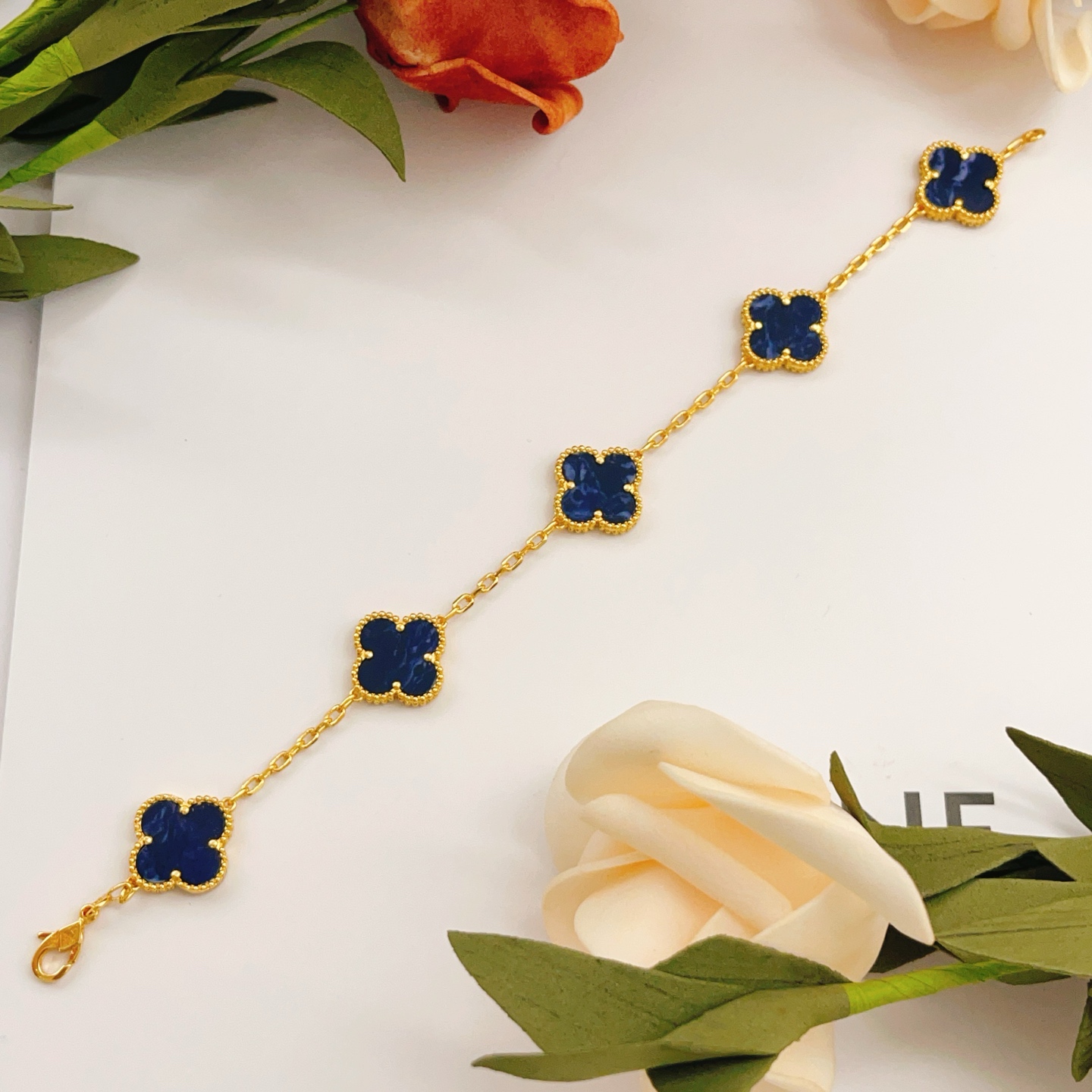 Van Cleef Arpels Alhambra bracelet Yellow gold with dark blue pietersite stone inlays 18cm
