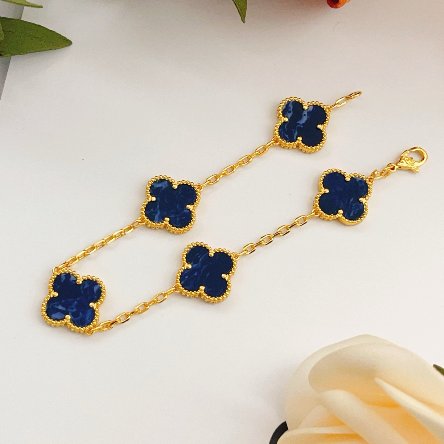 Van Cleef Arpels Alhambra bracelet Yellow gold with dark blue pietersite stone inlays 18cm