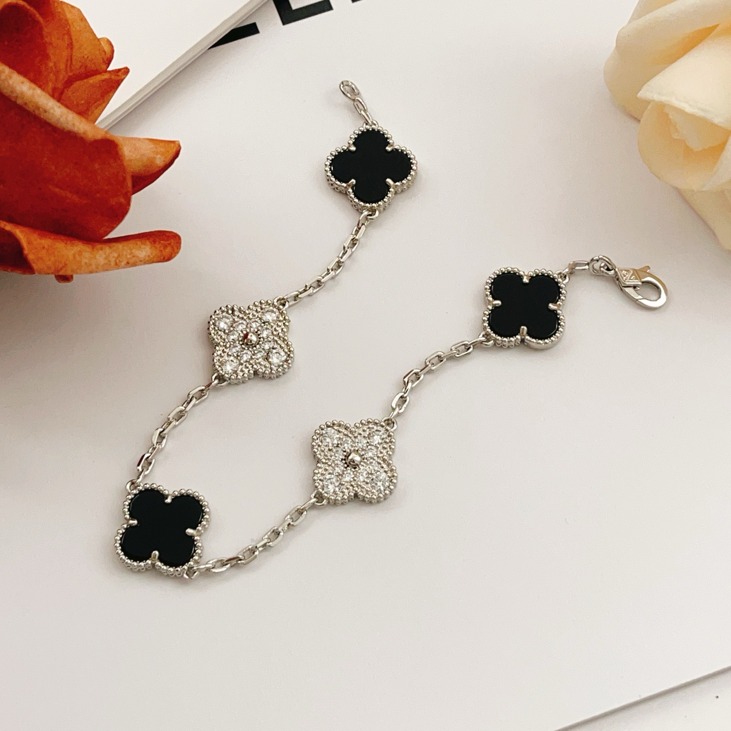 Van Cleef Arpels Alhambra bracelet Silver-toned white gold metal with black onyx and clear diamond accents 19cm