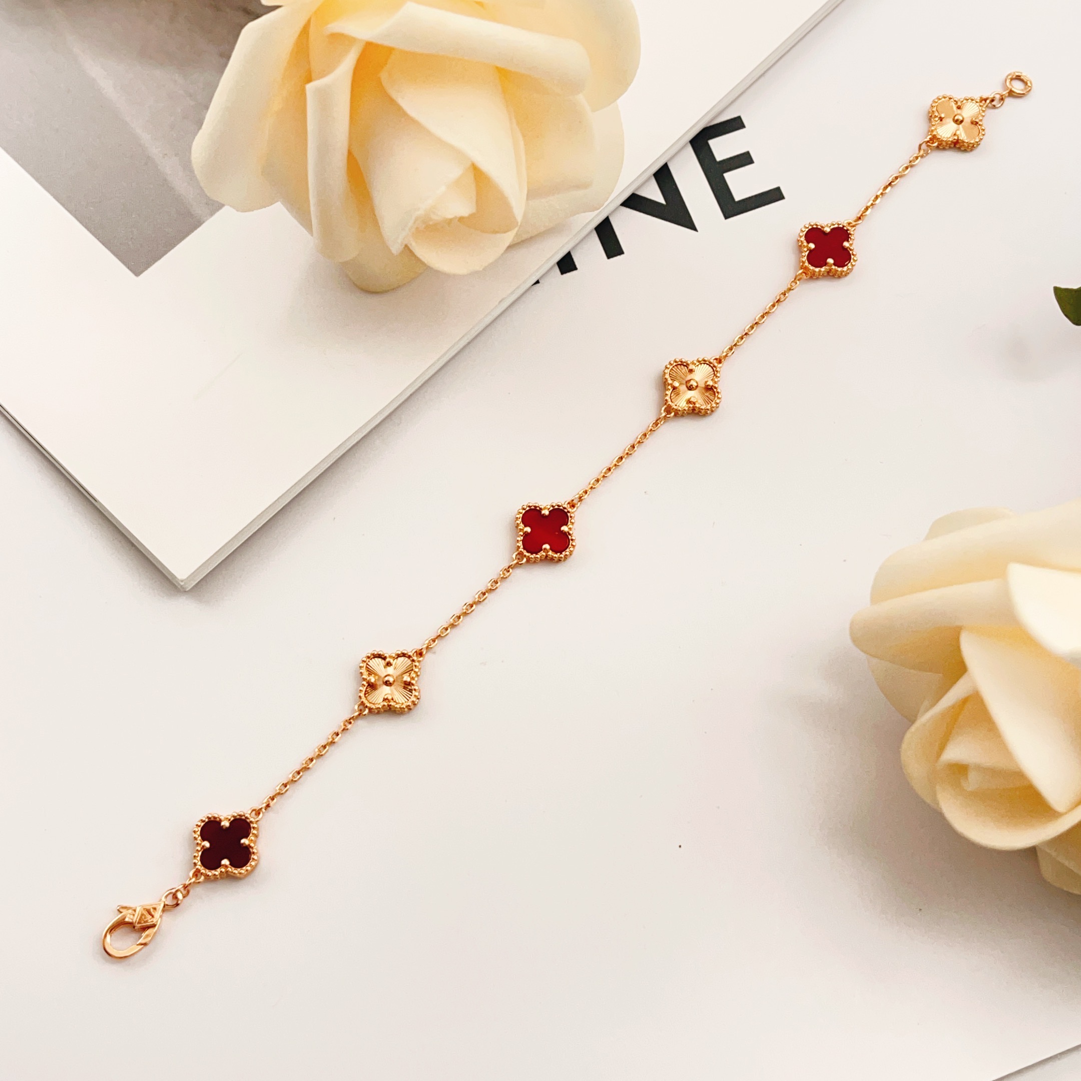 Van Cleef Arpels Sweet Alhambra bracelet Rose gold metal with red carnelian and guilloche rose gold clover motifs 16cm
