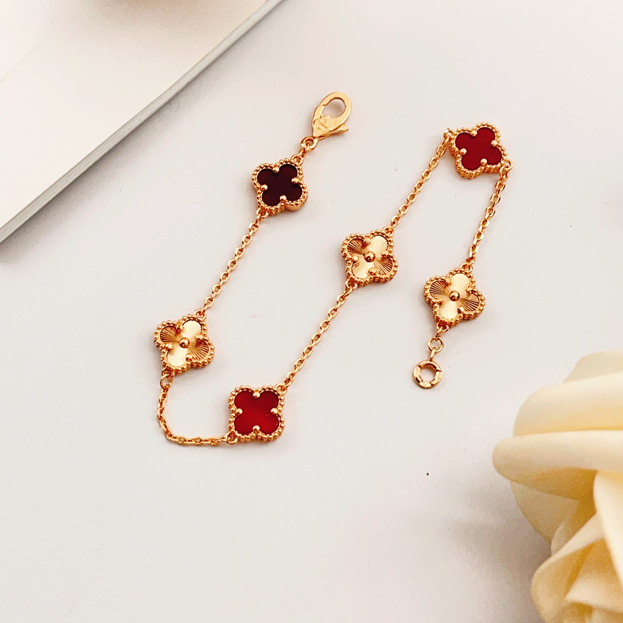 Van Cleef Arpels Sweet Alhambra bracelet Rose gold metal with red carnelian and guilloche rose gold clover motifs 16cm