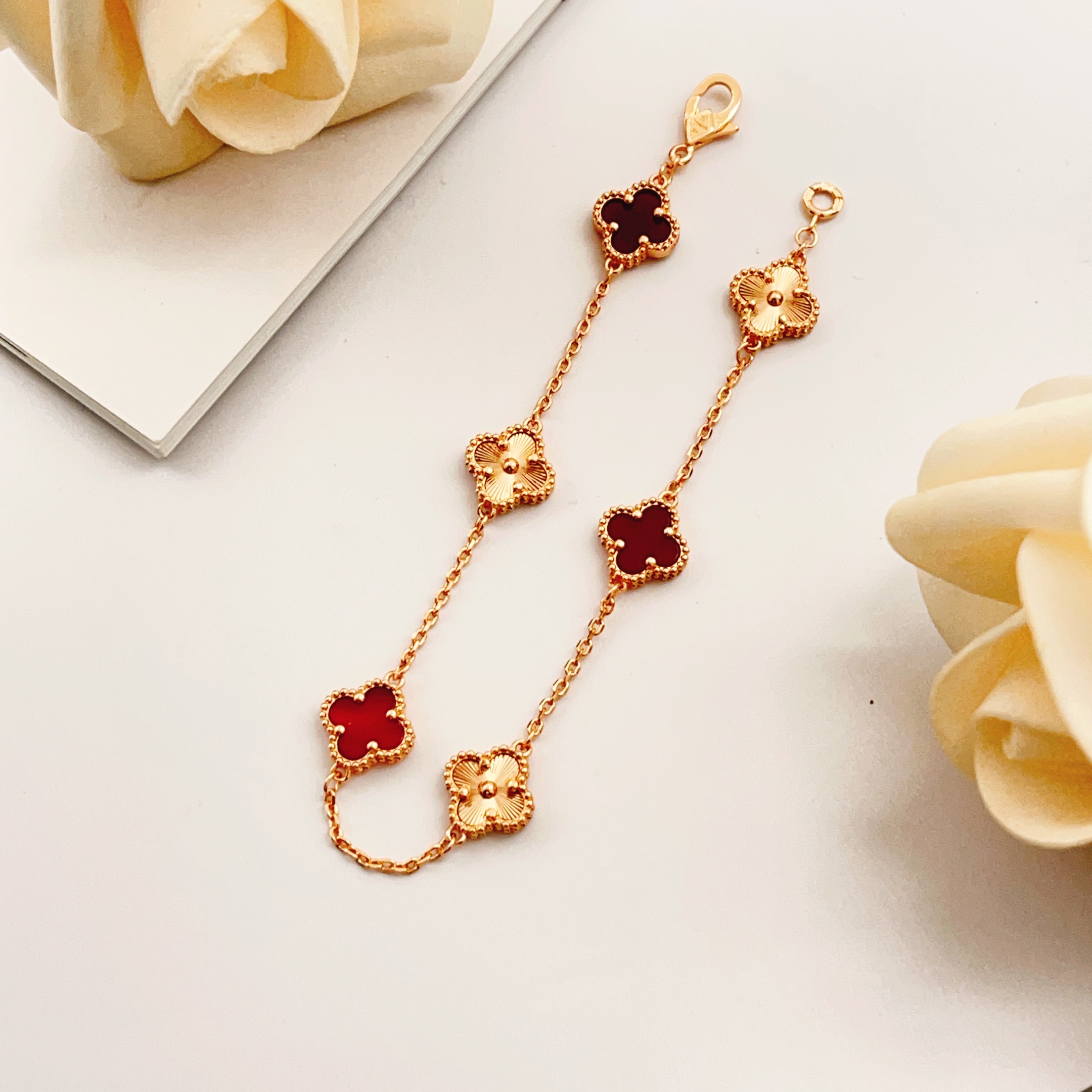 Van Cleef Arpels Sweet Alhambra bracelet Rose gold metal with red carnelian and guilloche rose gold clover motifs 16cm