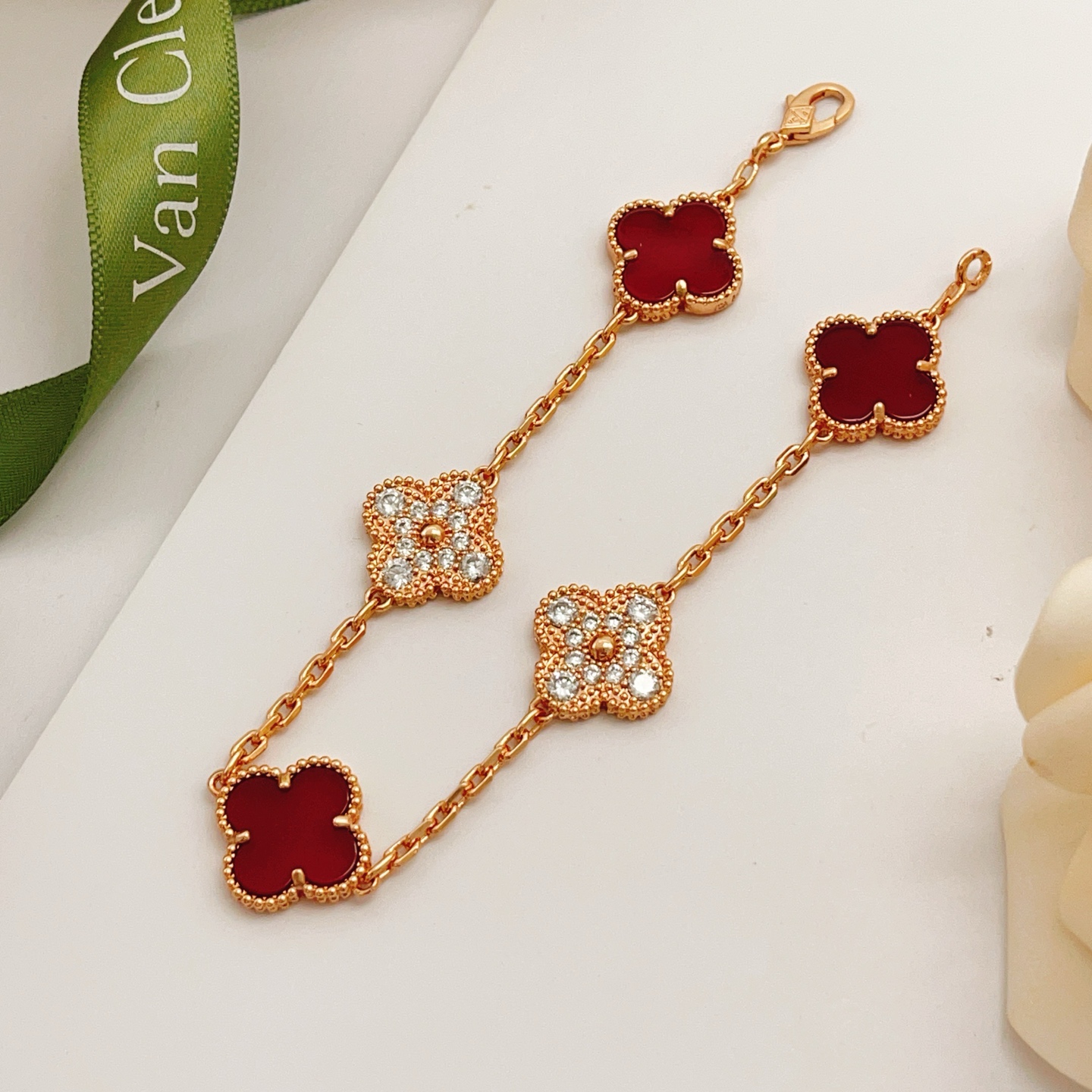 Van Cleef Arpels Vintage Alhambra bracelet Rose gold with carnelian red and clear diamond accents 18cm