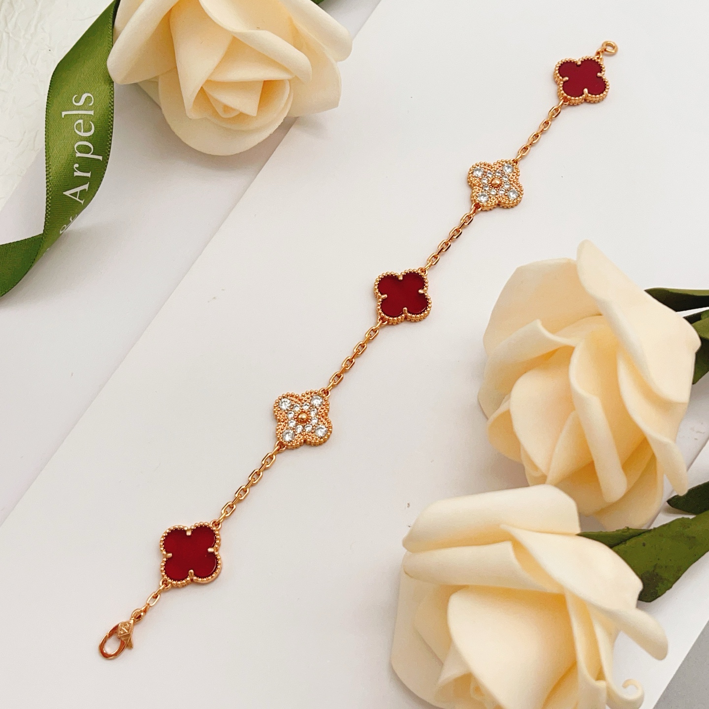 Van Cleef Arpels Vintage Alhambra bracelet Rose gold with carnelian red and clear diamond accents 18cm