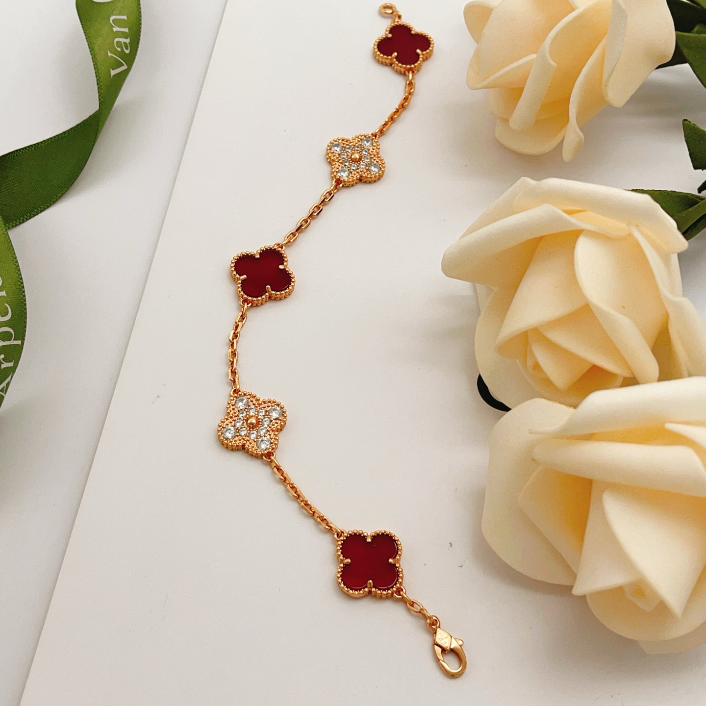 Van Cleef Arpels Vintage Alhambra bracelet Rose gold with carnelian red and clear diamond accents 18cm