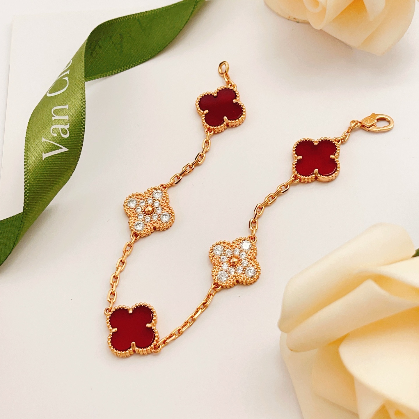 Van Cleef Arpels Vintage Alhambra bracelet Rose gold with carnelian red and clear diamond accents 18cm
