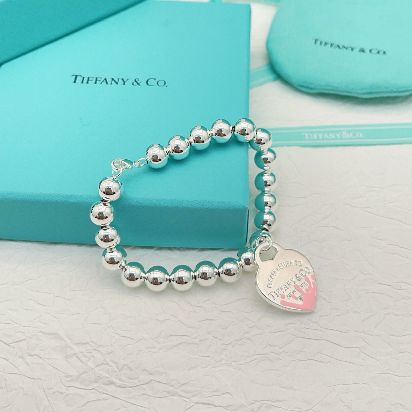 【Tiffany*帝芙尼最新款🆕🆕银色珍珠粉爱心手链】一致官网黄铜材质，非常的上镜‼️设计很特别值得入手
