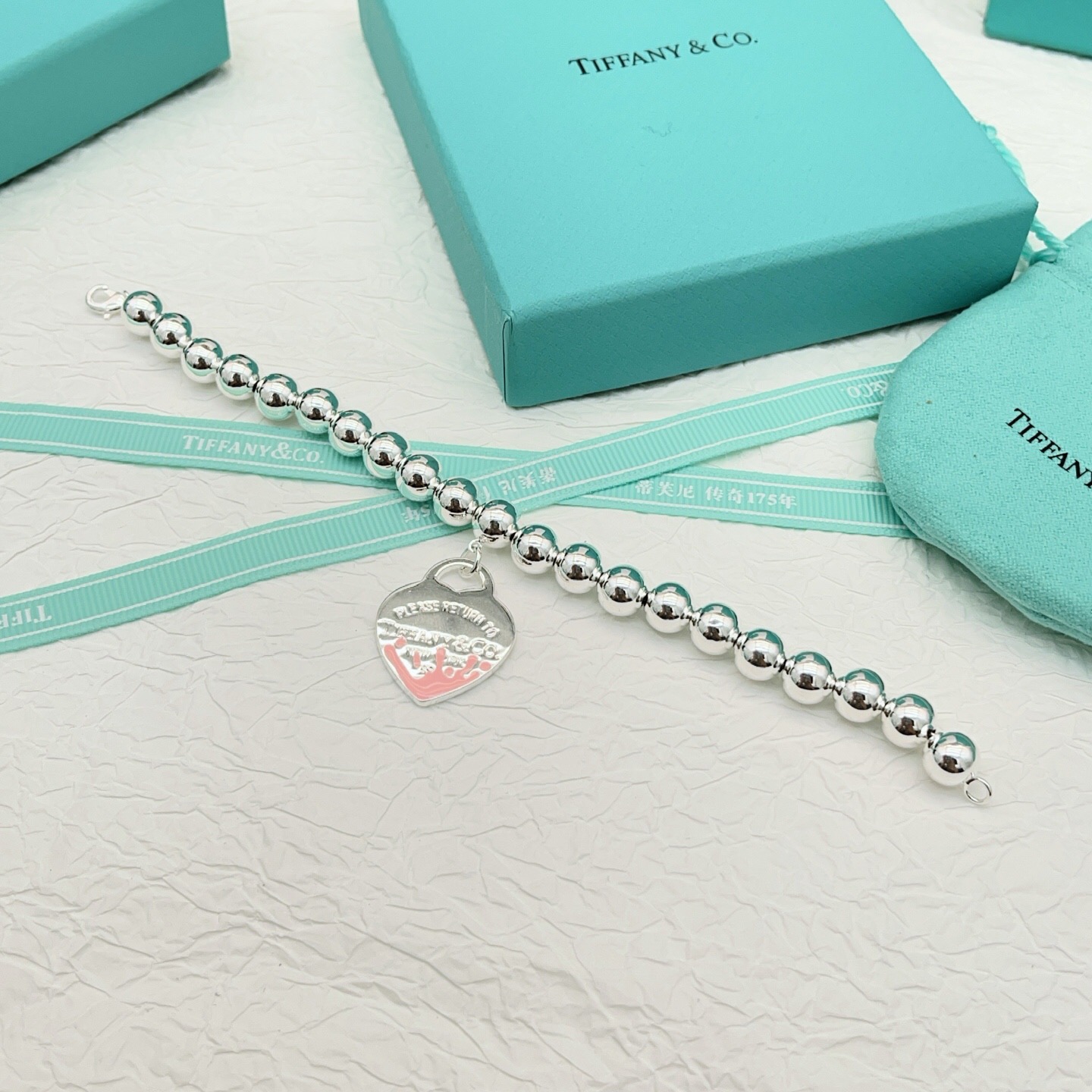 【Tiffany*帝芙尼最新款🆕🆕银色珍珠粉爱心手链】一致官网黄铜材质，非常的上镜‼️设计很特别值得入手