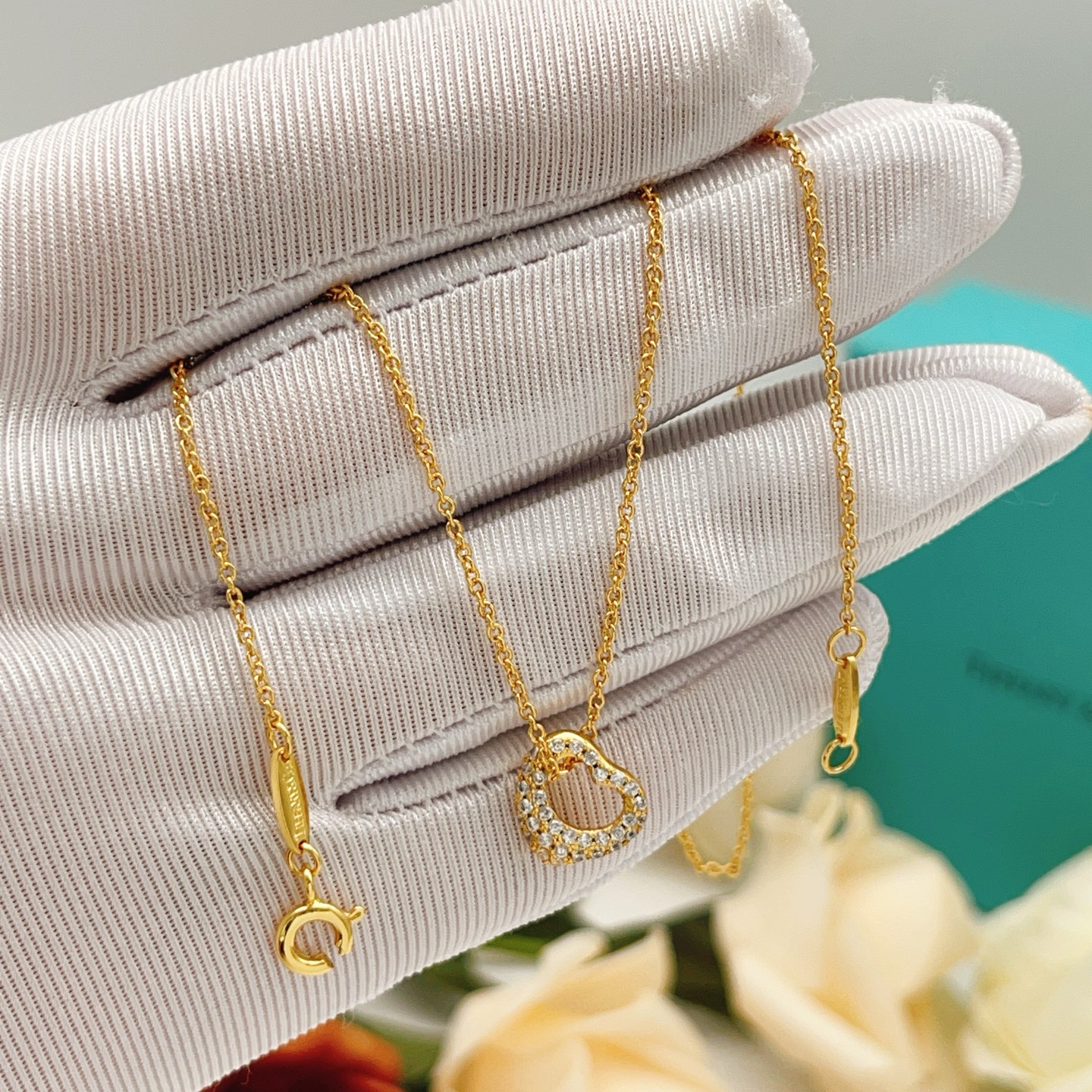 Tiffany Co Open Heart necklace yellow gold with clear diamond accents 16 inches