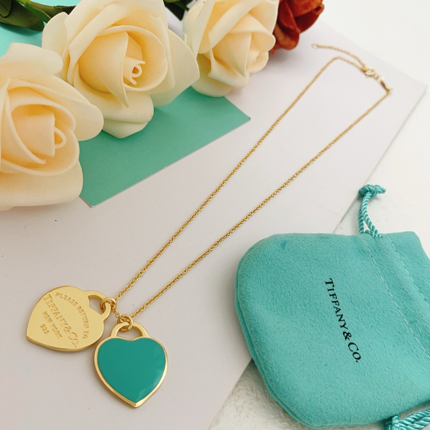 Tiffany Co Return to Tiffany Double Heart Tag necklace Gold-tone metal with Tiffany Blue enamel heart pendant 18 inches