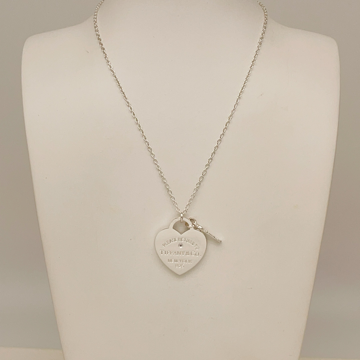 Tiffany Co Return to Tiffany Heart Tag with Key necklace Sterling silver with small clear diamond accent 18 inches
