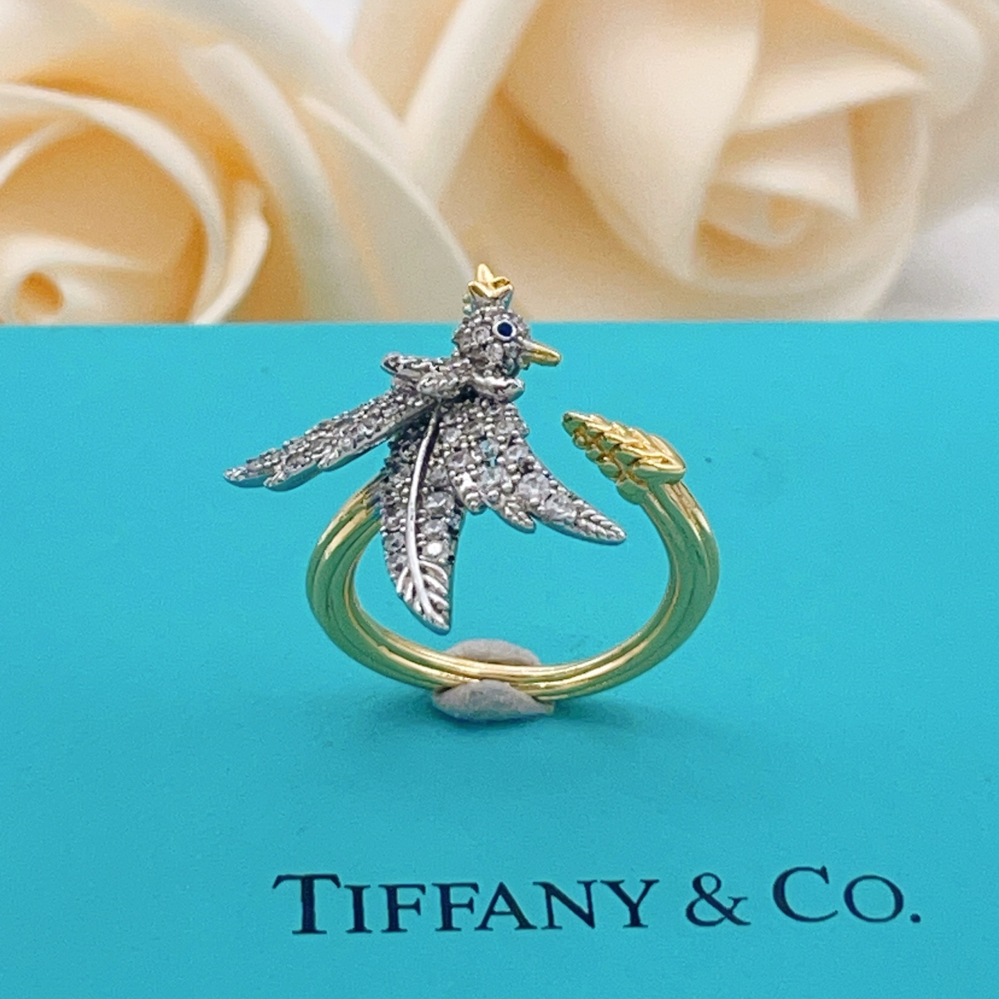 Tiffany Co 175th Anniversary Bird on a Wheat ring Two-tone yellow gold and platinum-plated metal clear pave diamonds blue sapphire eye US 7
