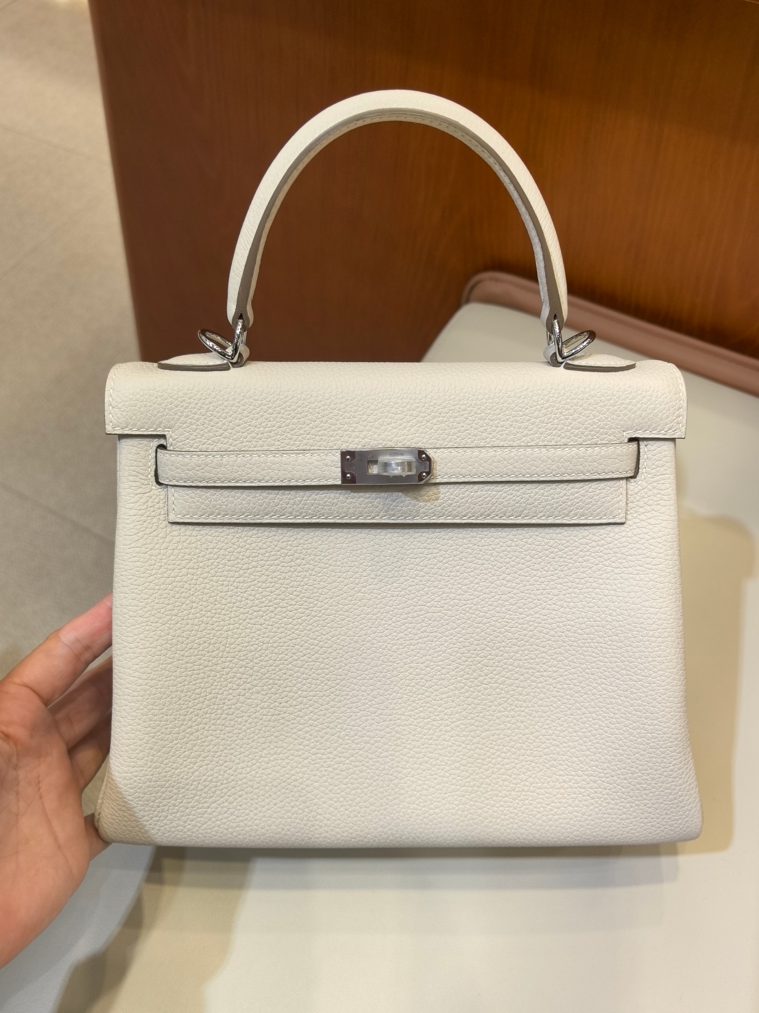 Hermès Kelly 25 Milkshake White Togo Leather Silver Hardware Handbag