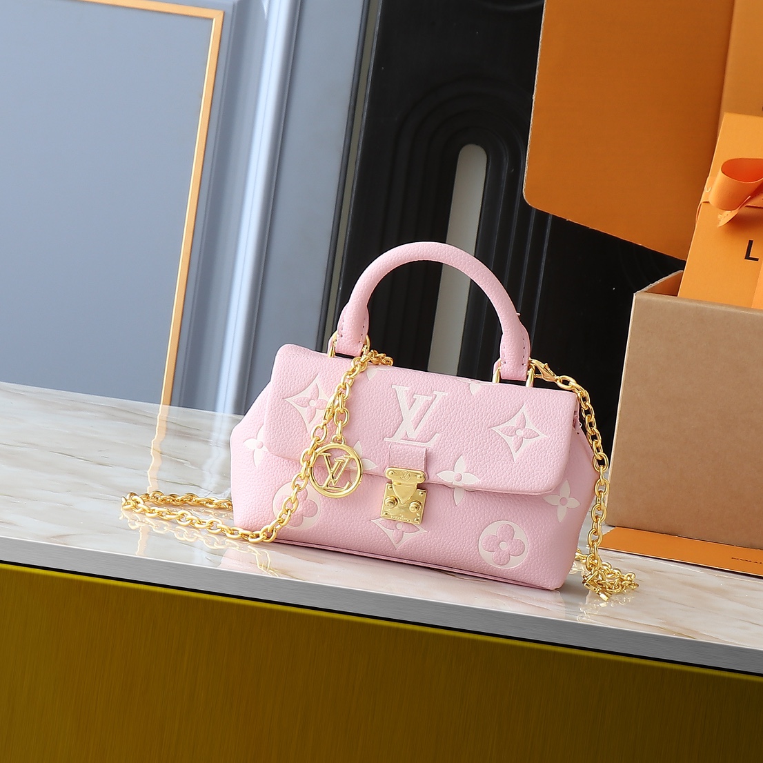 Louis Vuitton Nano Madeleine Monogram Empreinte Leather Pink Crossbody Bag 2 i1740852658 597 0