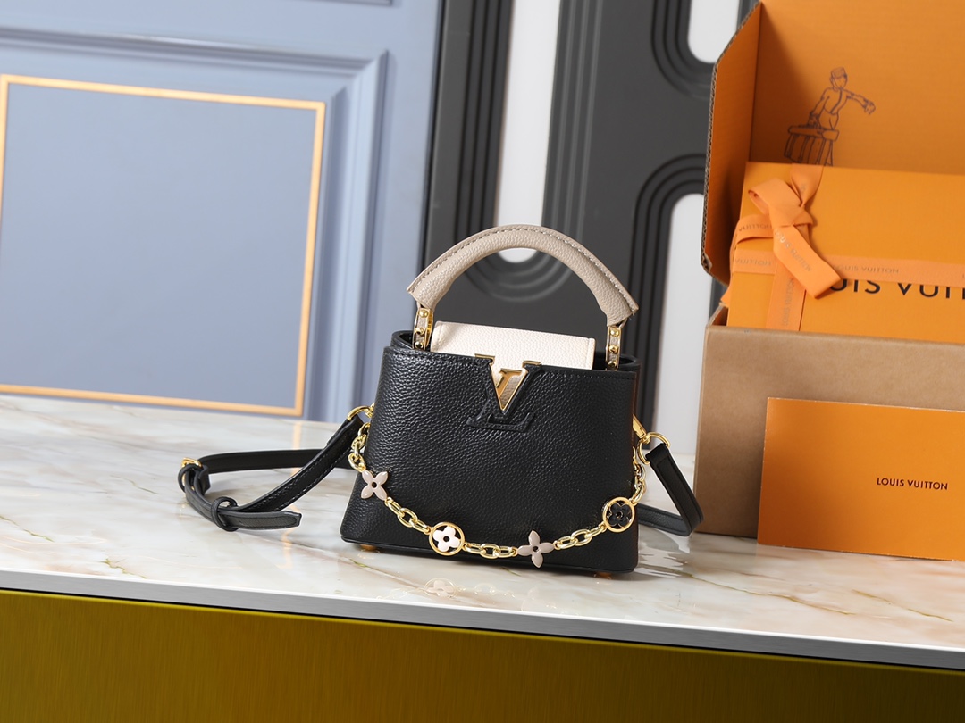 💰340💰广州货 升级原版 M25386 M11343 M11342 M22514 M22375 M20845 M20844 本款 Capucines BB 手袋取材 Taurillon 牛皮革，为手柄、翻盖和包身分别渲染韵致各异的柔和色调，再于可拆卸链条融入珐琅 Monogram 花卉装饰。搭配可拆卸肩带，实现多种背携体验。尺寸:21 x 13.6 x 8 (厘米) ((长 x 高 x 宽)