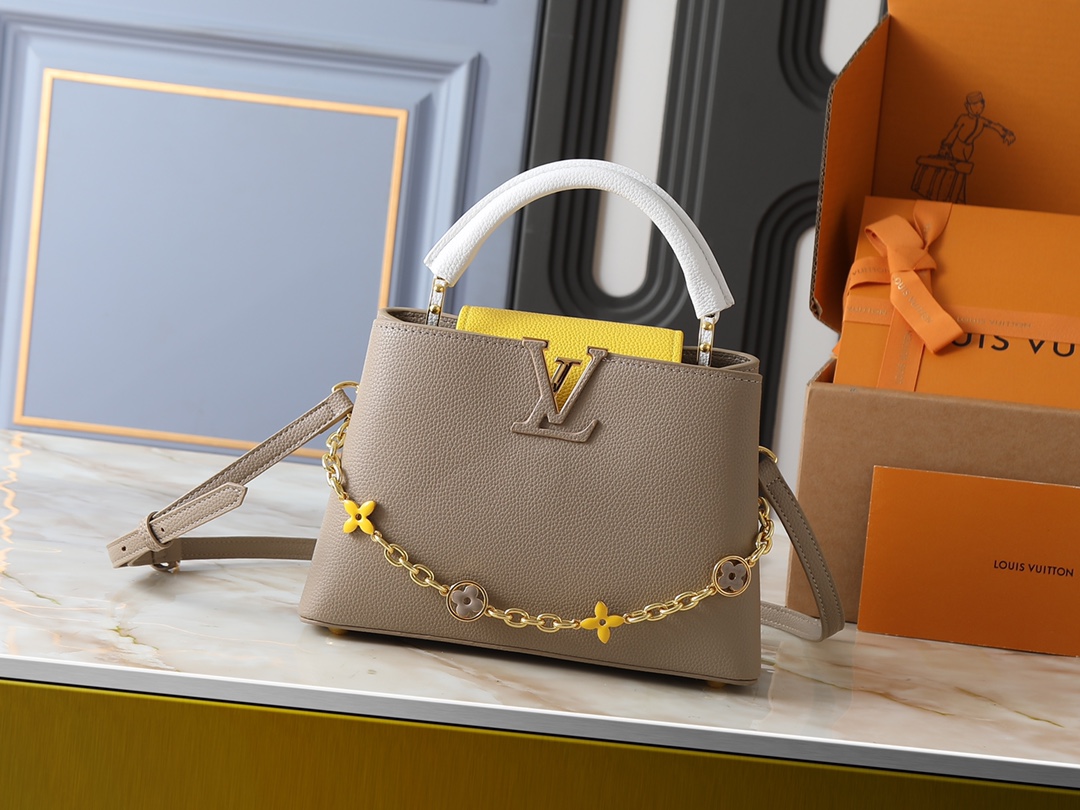 💰350💰广州货 升级原版 M25386 M11343 M11342 M22514 M22375 M20845 M20844 本款 Capucines BB 手袋取材 Taurillon 牛皮革，为手柄、翻盖和包身分别渲染韵致各异的柔和色调，再于可拆卸链条融入珐琅 Monogram 花卉装饰。搭配可拆卸肩带，实现多种背携体验。尺寸:27 x 17.3 x 9 (厘米) ((长 x 高 x 宽)