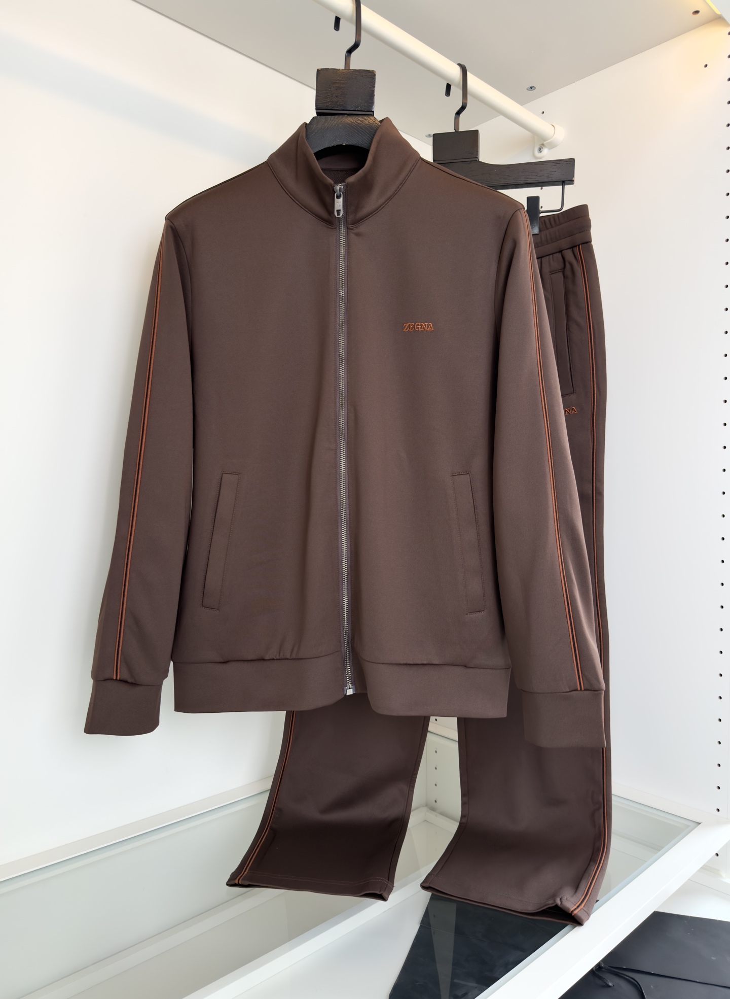 “Classic Geometric Sportswear Outfit with Letter Embroidery, Zipper Locks, and Detailed Design in Dark Blue”