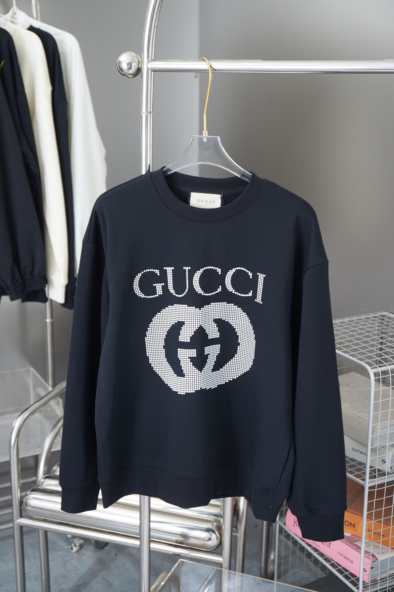 Gucci GUCCI GC 24FW Sudadera con cuello redondo y estampado de cuentas con doble G entrelazado. Lujo discreto, prenda i…