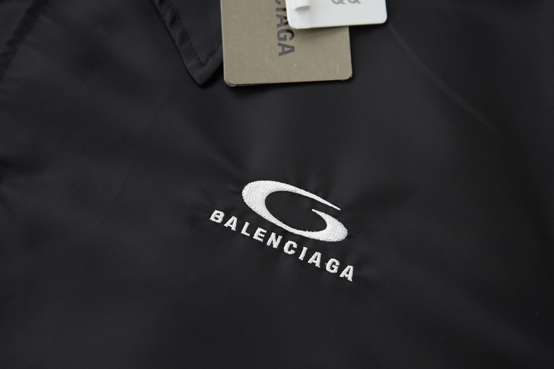 Balenciaga 巴黎世家 𝘽𝘼𝙇𝙀𝙉𝘾𝙄𝘼𝙂𝘼 BLCG 26SS NBA联名尼龙防水翻领教练夹克