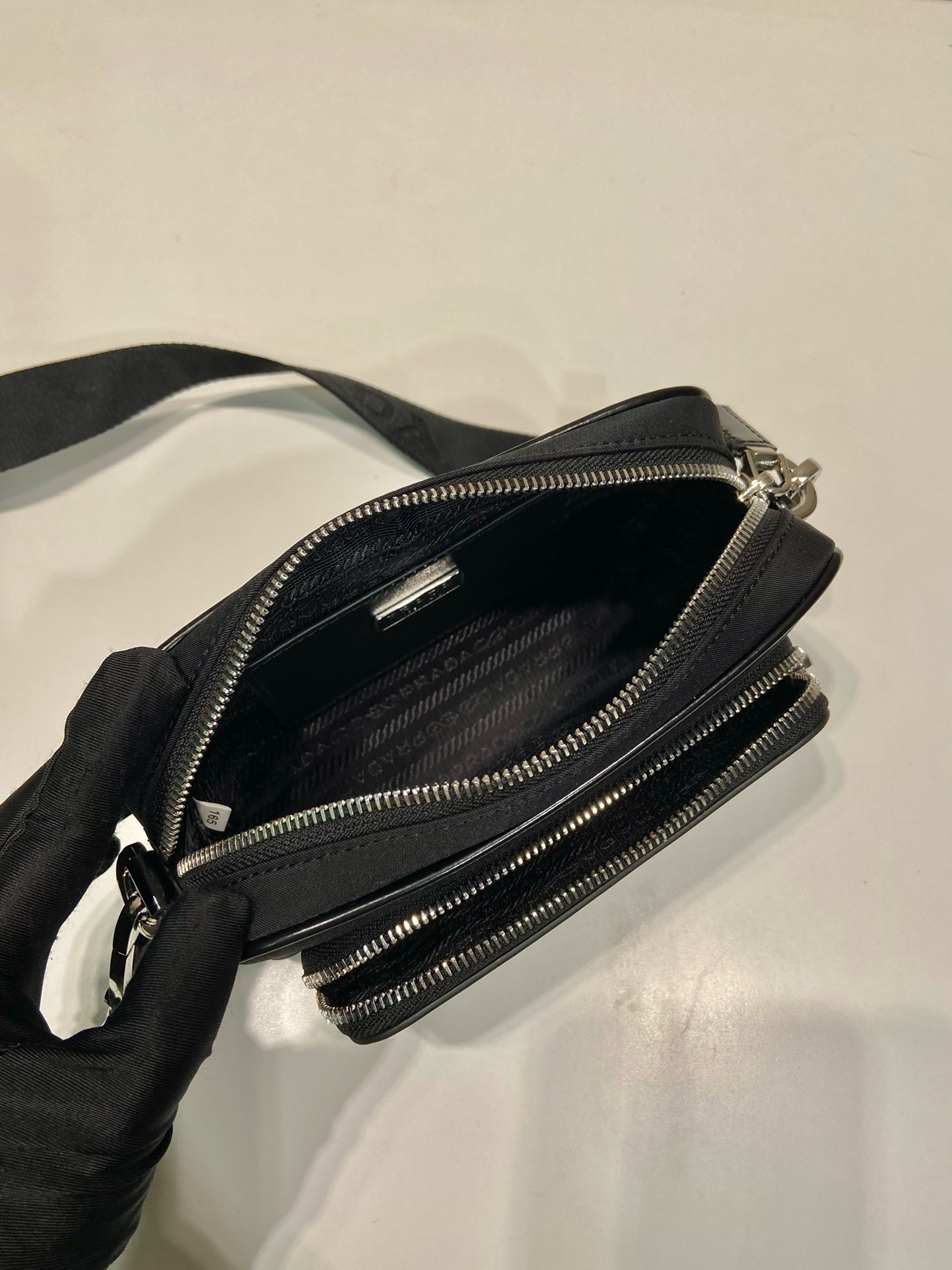 Prada Re-Nylon and Leather Shoulder Bag - Sleek, Versatile, and Sustainable 9 i1745482123 3013 0