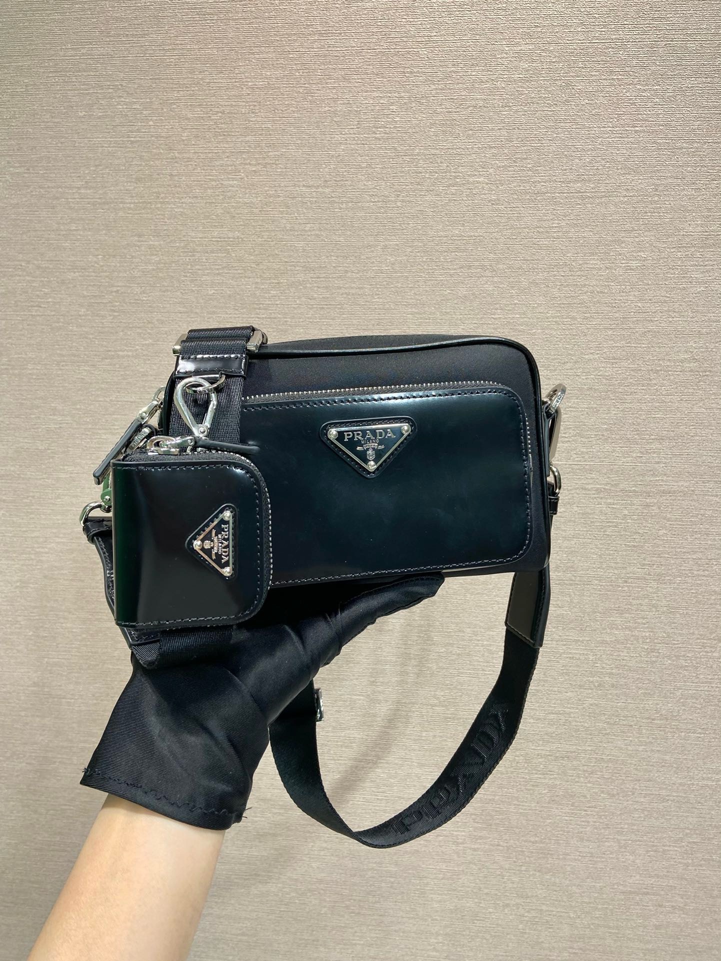 Prada Re-Nylon and Leather Shoulder Bag - Sleek, Versatile, and Sustainable 2 i1745482124 2261 0