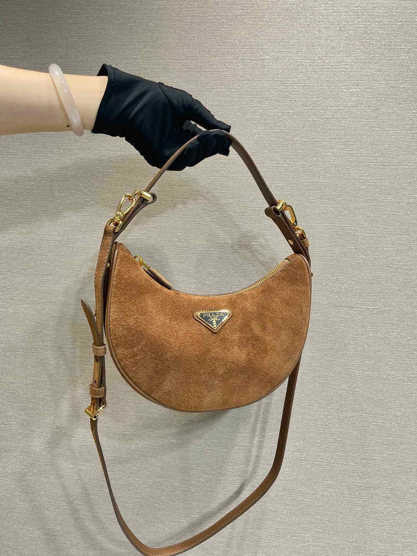 Prada Moon Suede Shoulder Bag with Adjustable Straps - Chic and Versatile 1 i1745648381 8299 5