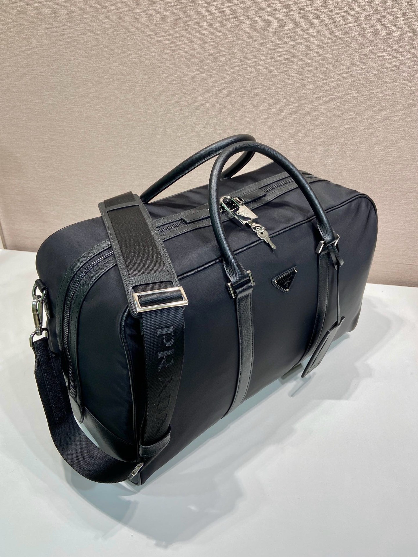 Prada Re-Nylon Duffle Bag with Saffiano Leather Trim - Travel in Style 3 i1751508672584 5871 0 1