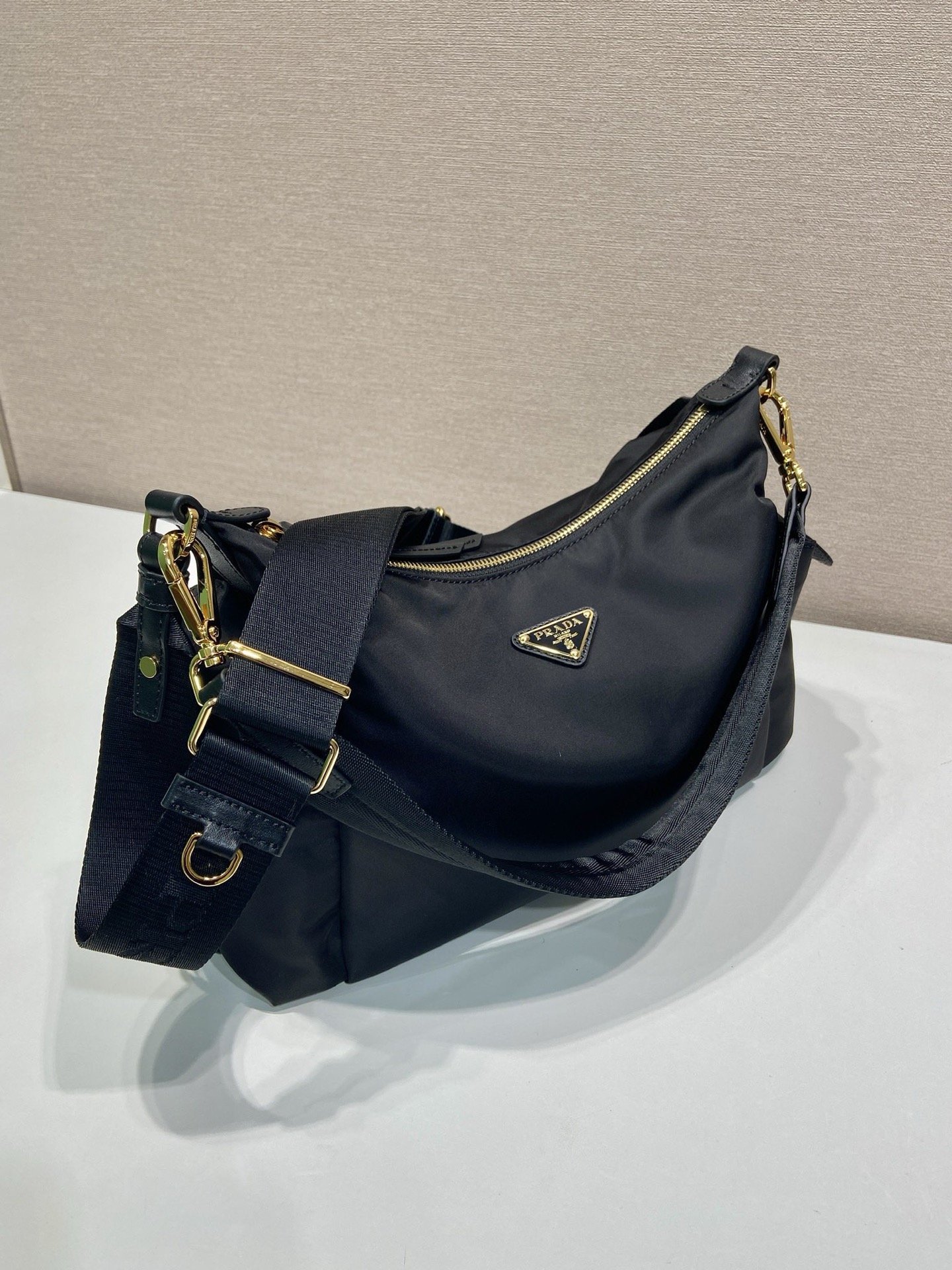 Prada Re-Nylon and Leather Shoulder Bag with Adjustable Straps 1BC264 3 i1754639871576 2611 0 1