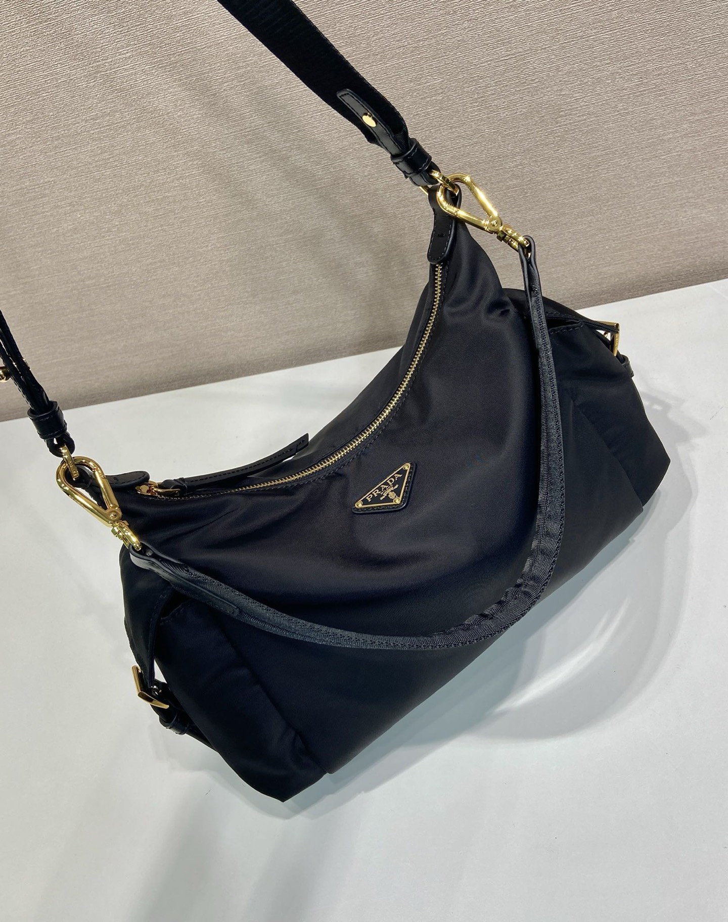 Prada Re-Nylon and Leather Shoulder Bag with Adjustable Straps 1BC264 4 i1754639876104 9051 0 2