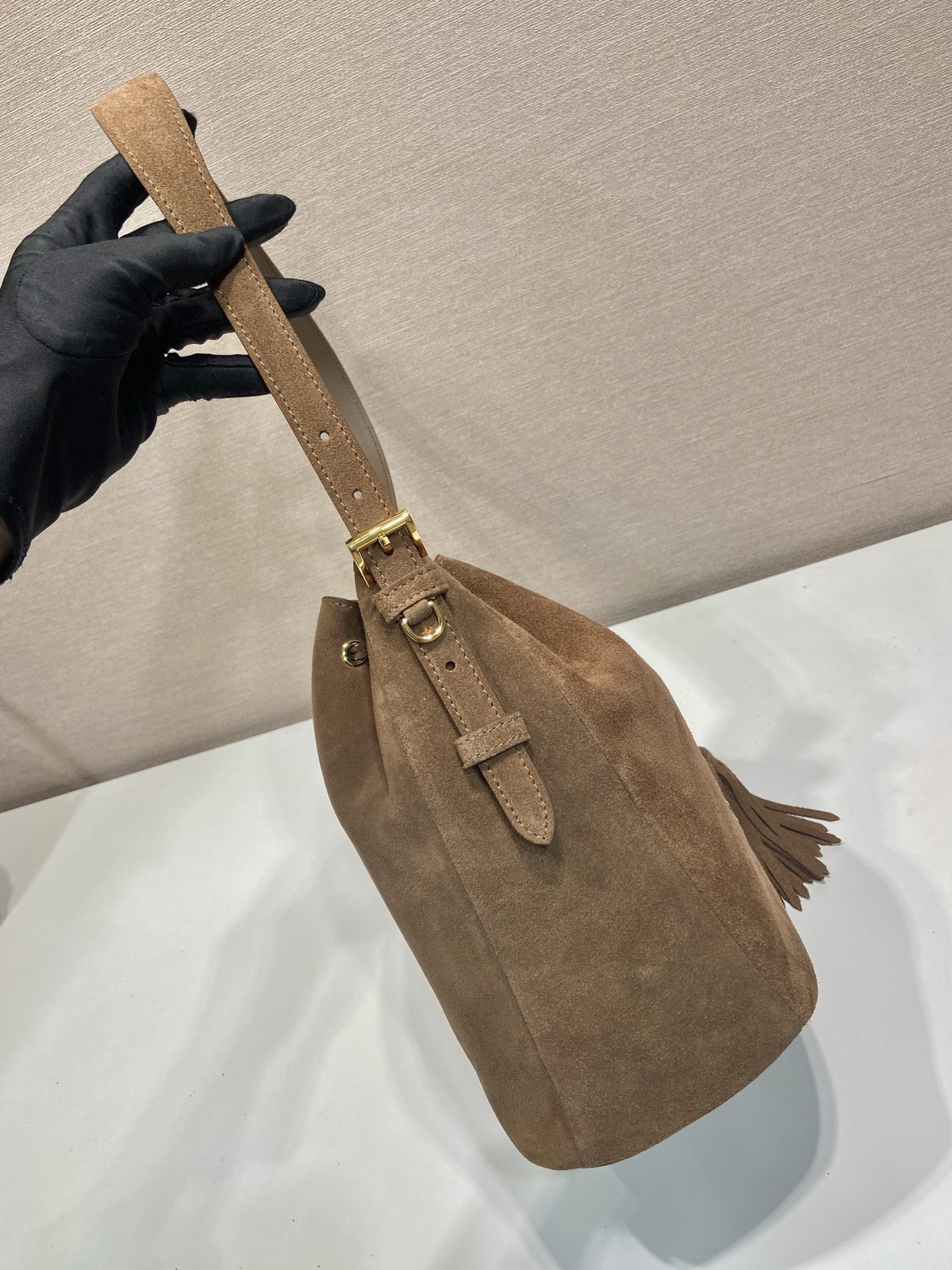 Prada Suede Bucket Bag with Tassel Drawstring Closure - Stylish & Versatile 5 i1756800122589 8705 0 4