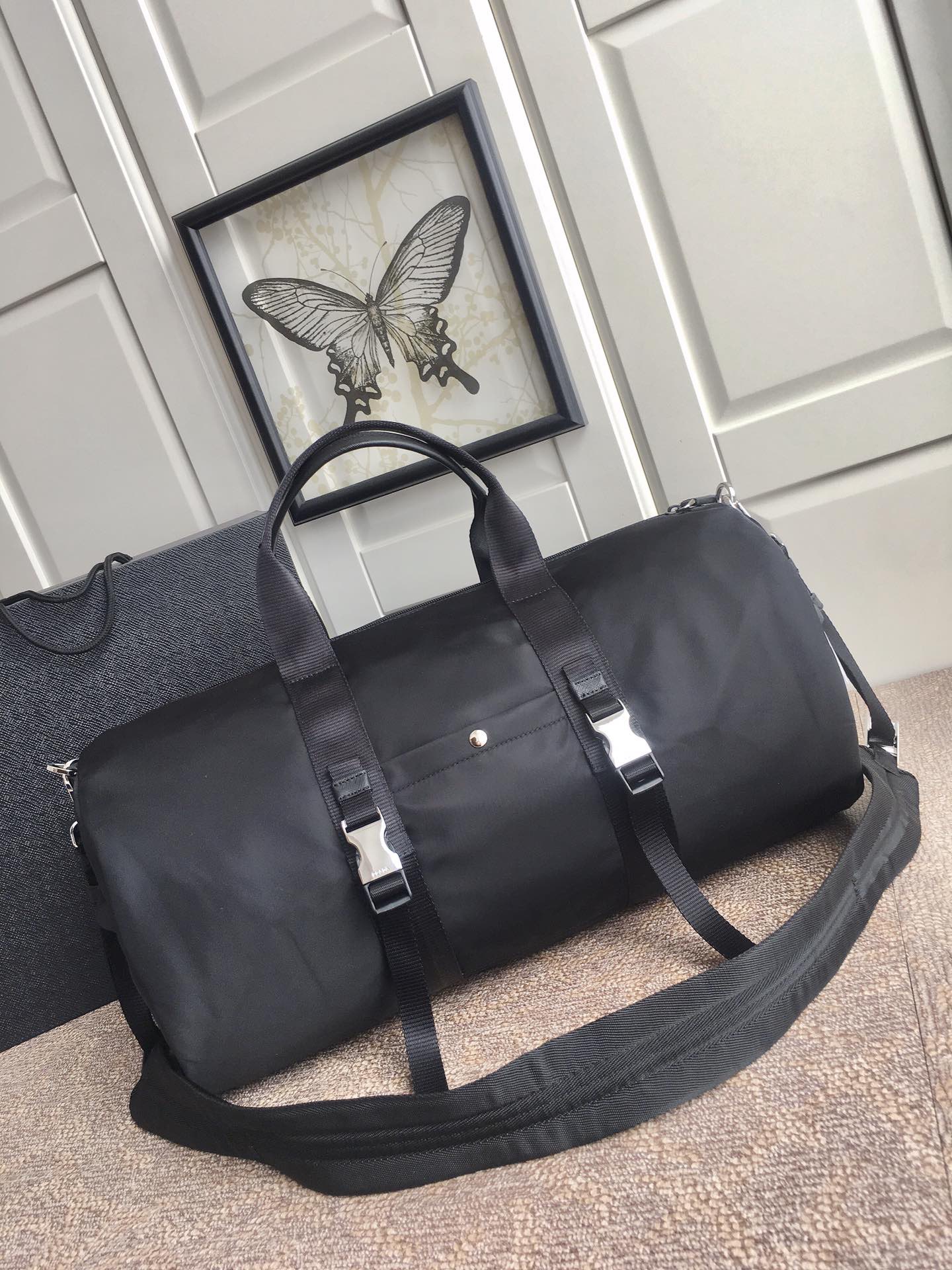 Prada Black Travel Bag with Signature Triangle Logo - Lightweight & Durable 6 i1756971918362 2073 0 4
