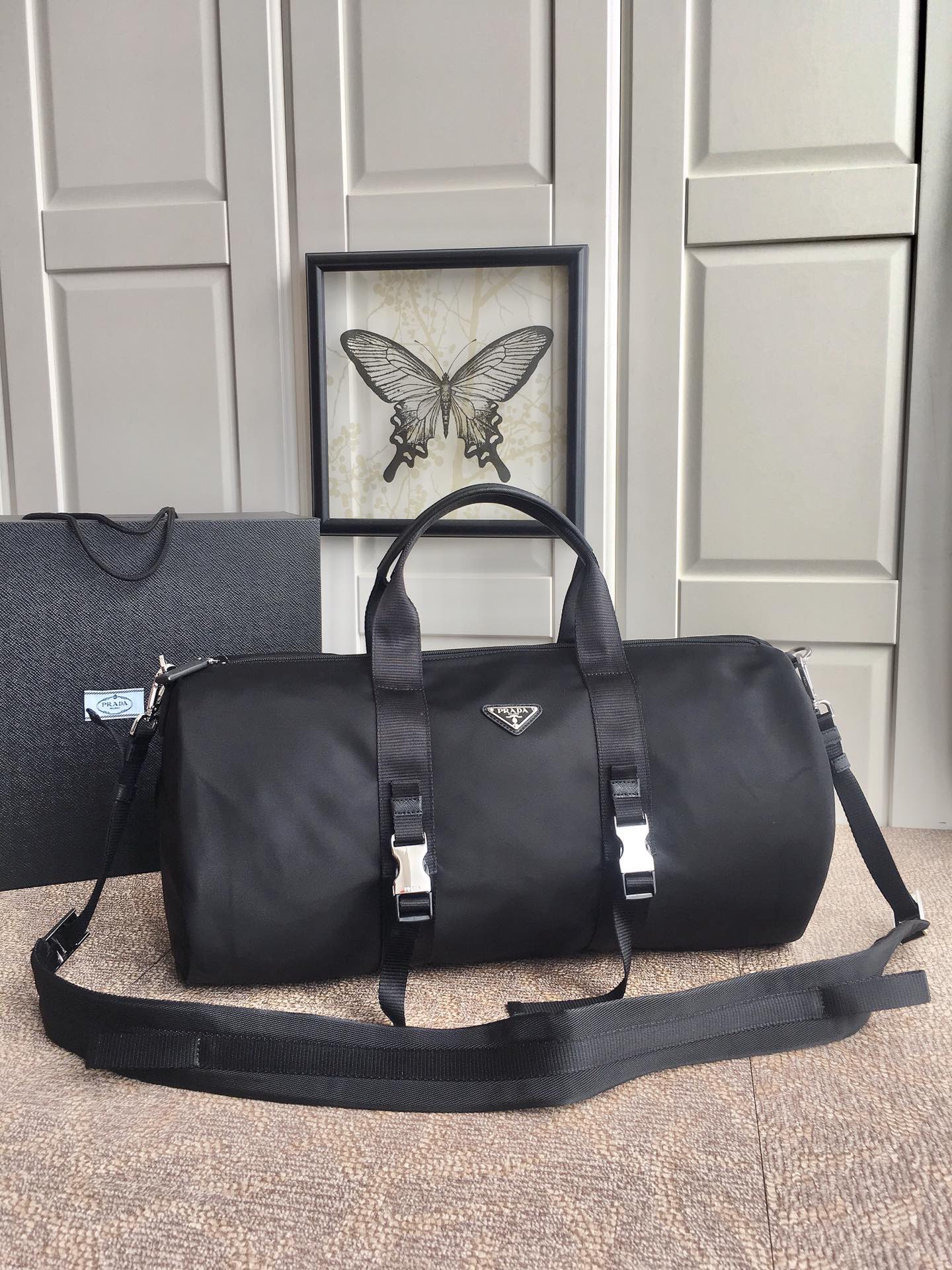 Prada Black Travel Bag with Signature Triangle Logo - Lightweight & Durable 2 i1756971921815 5580 0 0