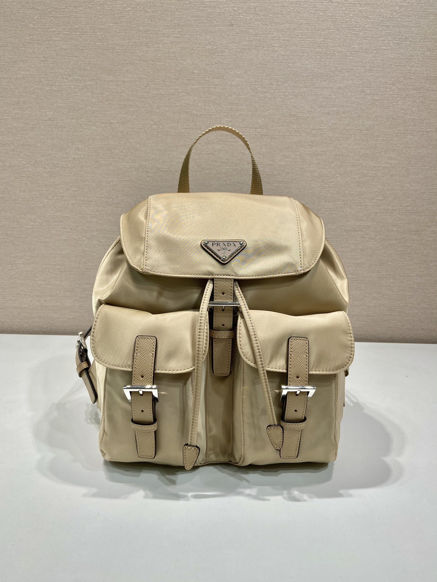 Prada 1BZ677 Small Backpack Beige Nylon and Leather Trim, 28x23.5x12cm 1 i1757663015270 2519 0 0
