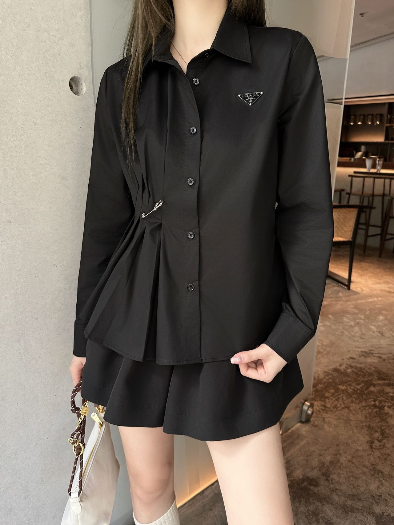 Prada Women's Black Long Sleeve Shirt with Pleated Detail and Pin