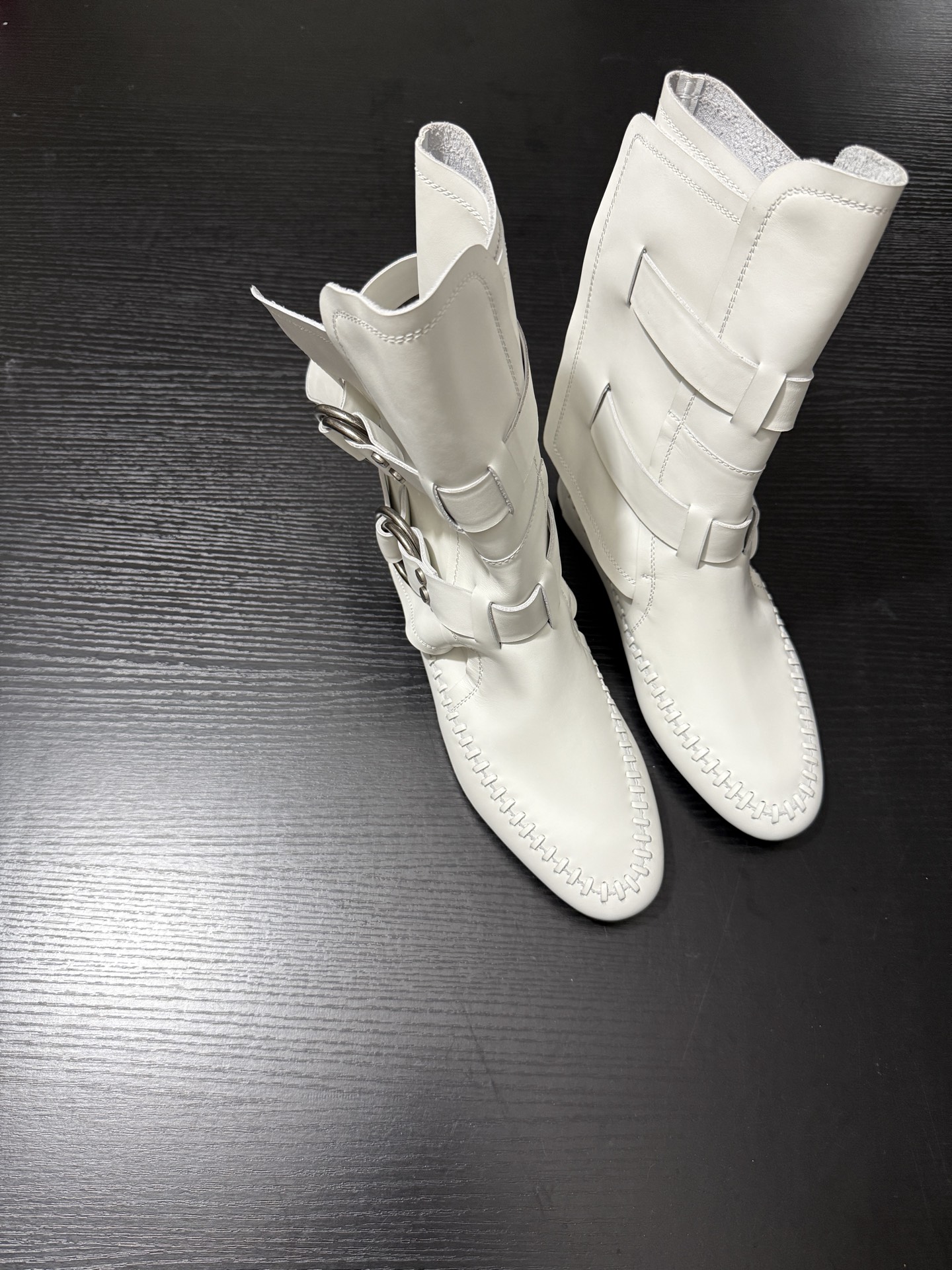 Stylish Leather Boots with Belt Buttons and Metal Rings by Ann Demeulemeester