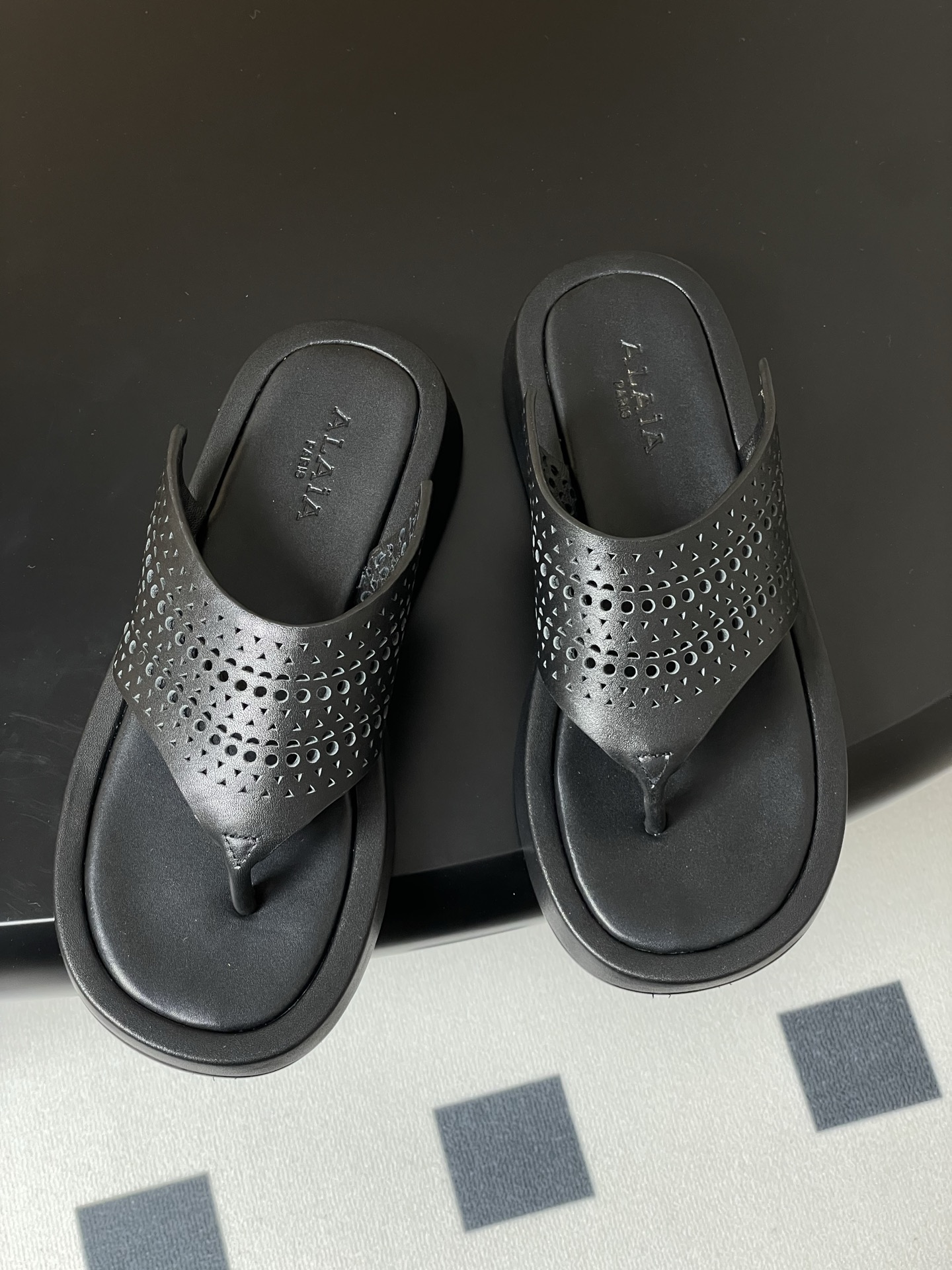 ALAIA Women's Flat Sandals Classic Vintage Hollowed-Out Carved Leather Thong Sandals 3 i1742000410159 2036 0 1