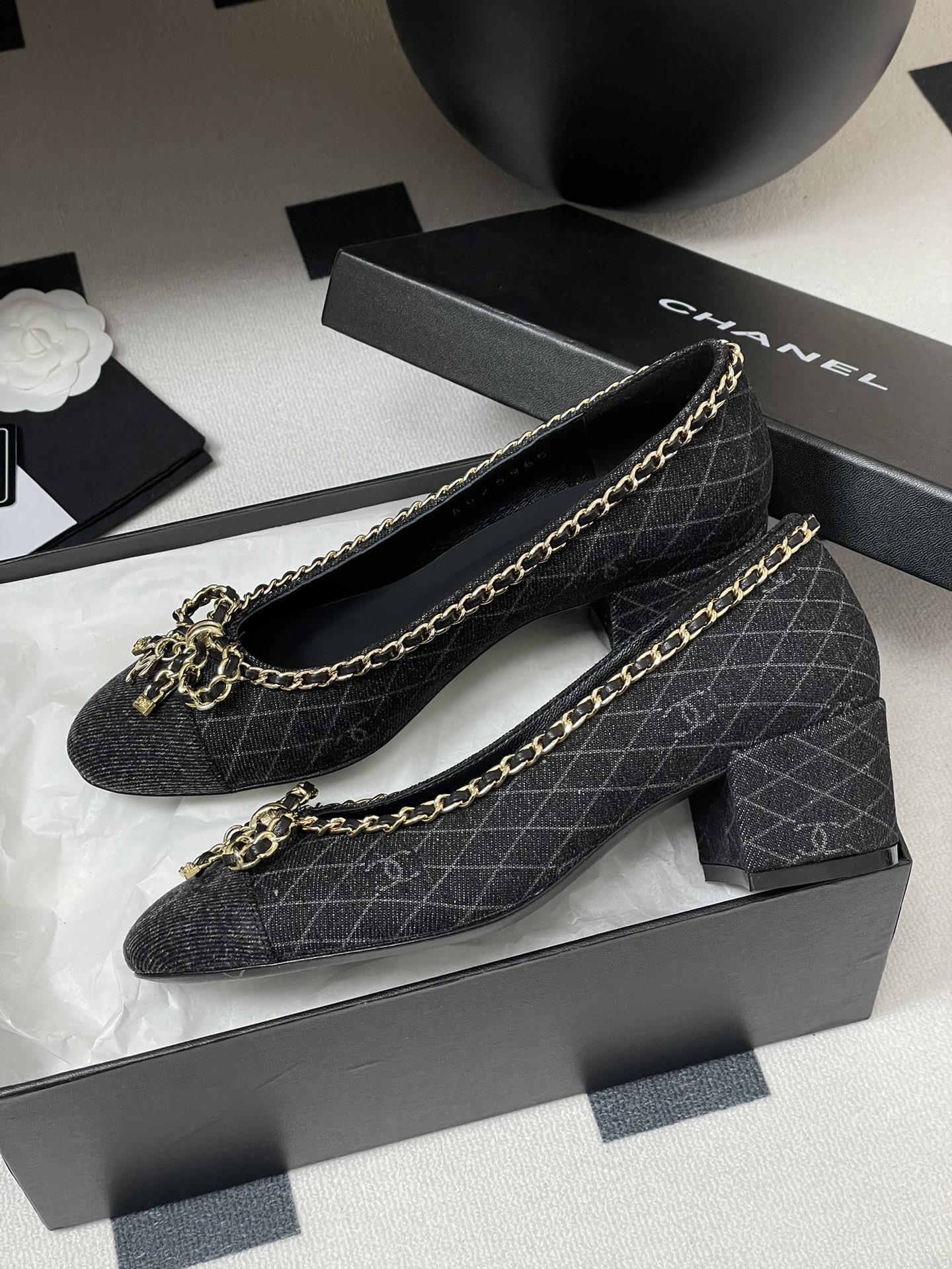 Chanel Denim Bow Chain Pumps - Classic Elegance and Comfort for Every Day 1 Chanel Denim Bow Chain Pumps - Classic Elegance and Comfort for Every Day