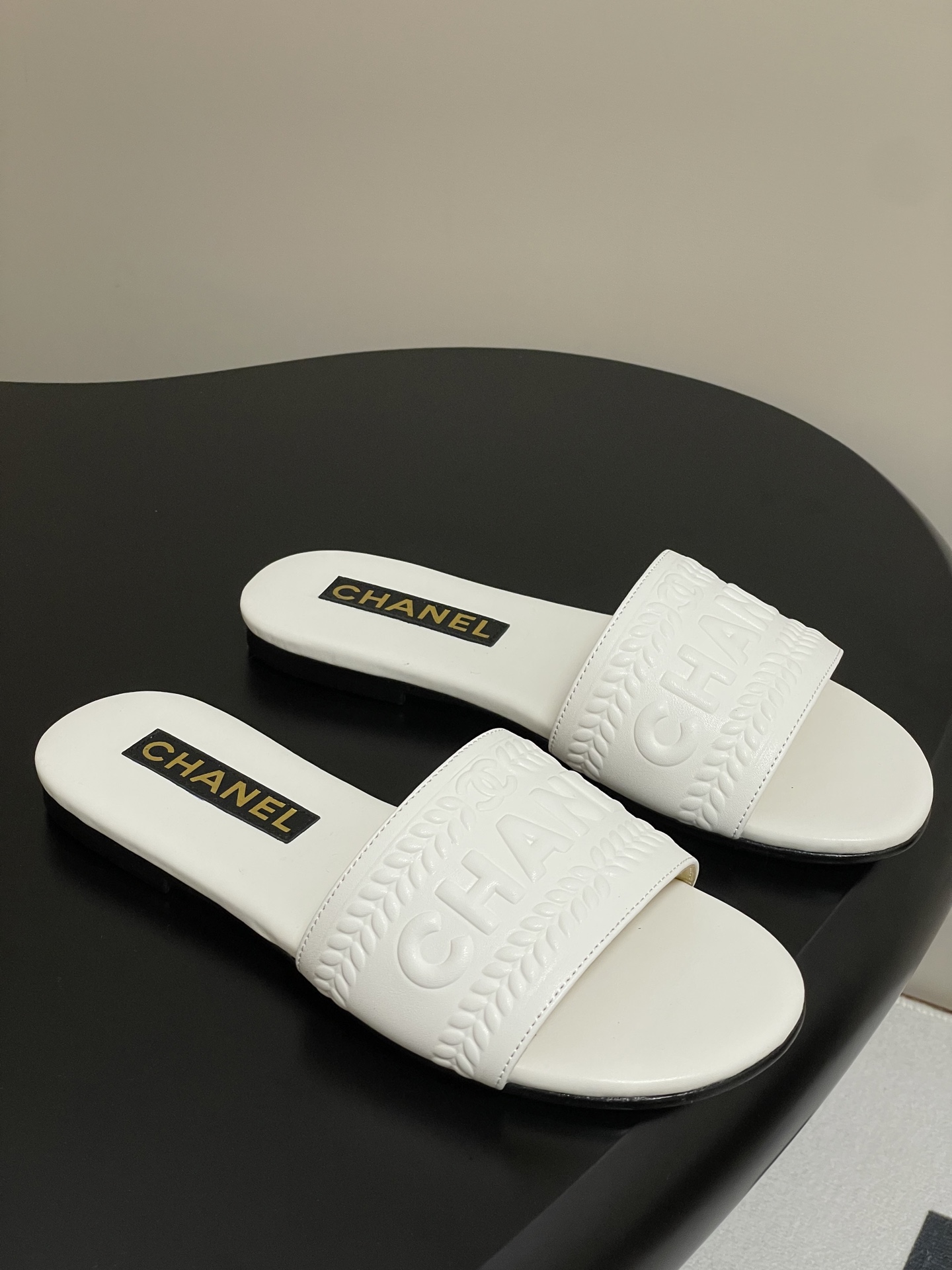 Chanel Women's White Leather Flat Slide Sandals With Embroidered Logo 1 Chanel Women's White Leather Flat Slide Sandals With Embroidered Logo
