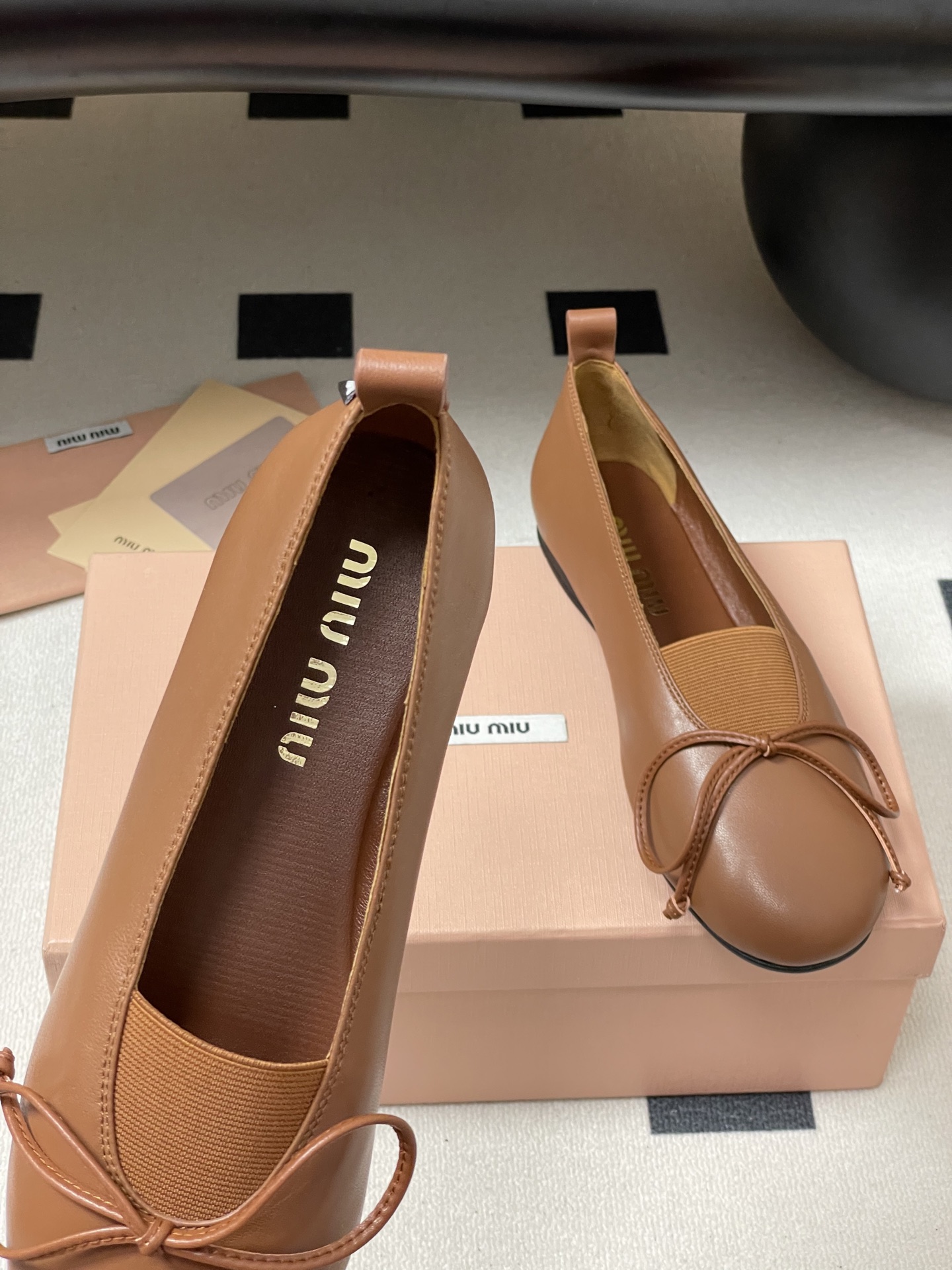 Miu Miu Women's Leather Ballerina Flats with Bow Accent - Chic and Comfortable 7 i1750195132361 6396 0 3