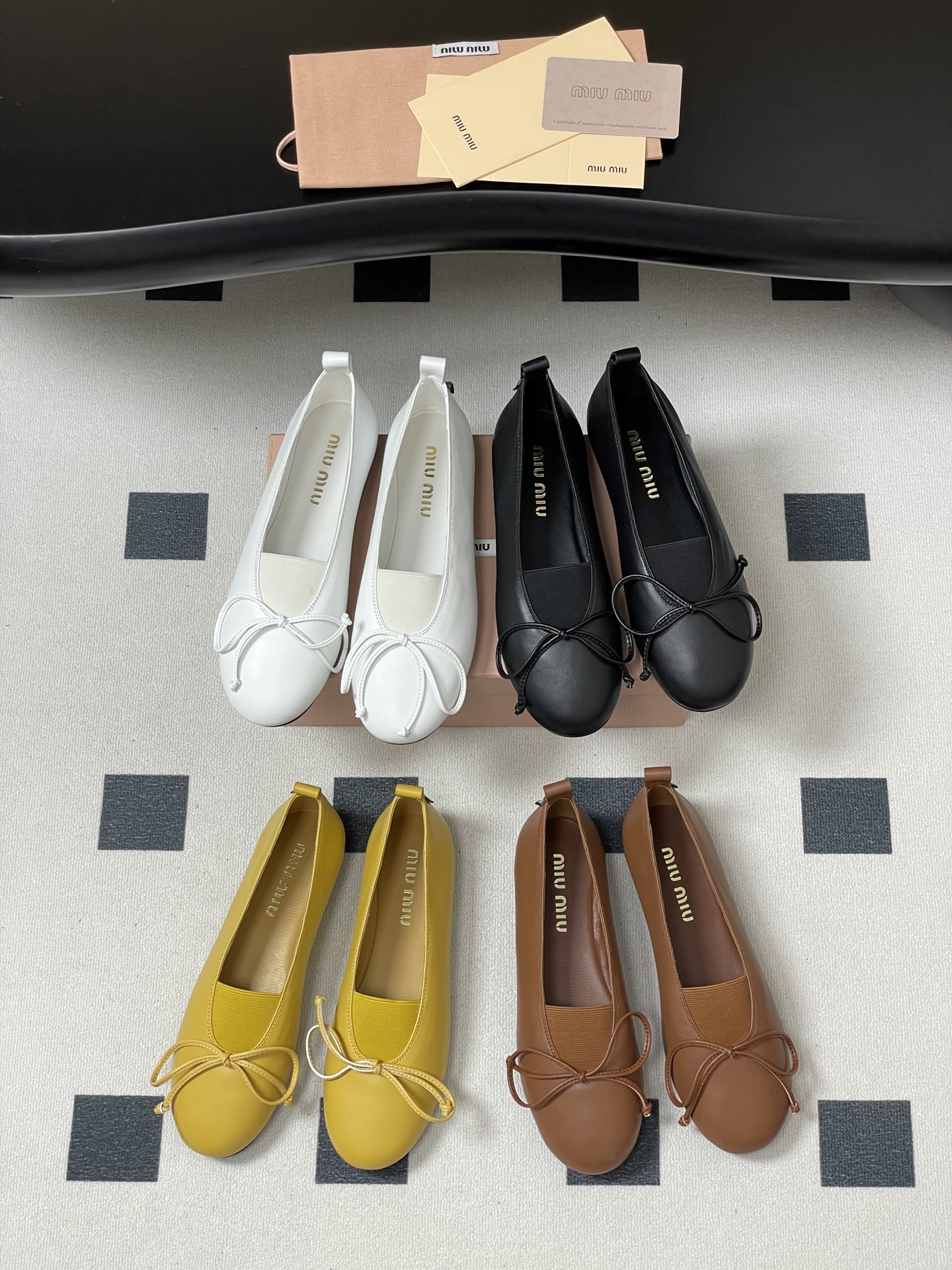 Miu Miu Ballerinas: Chic Bow-Detailed Leather Ballet Flats for Women
