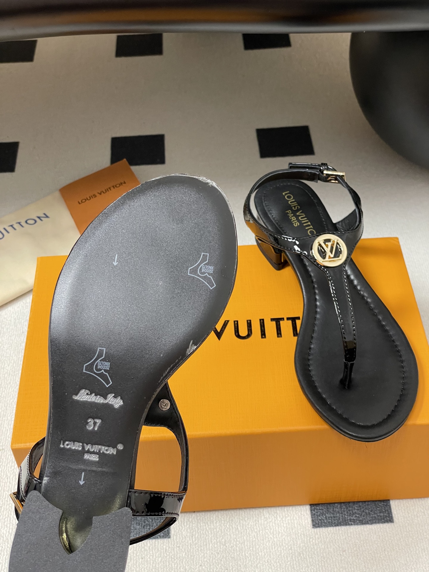Louis Vuitton Vibe Thong Sandals - Black Leather with Iconic Gold Detailing 9 i1750282122947 3535 0 2