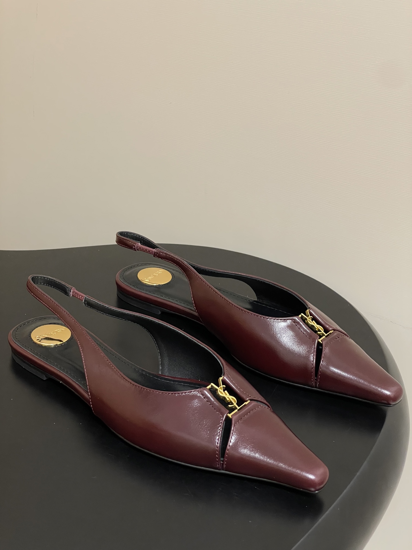 Title: Saint Laurent Women’s Shoes Collection at St. Roland Show Summary: Saint Laurent’s latest show at St. Roland features women’s shoes with cow, sheep, and Italian skin materials. Sizes