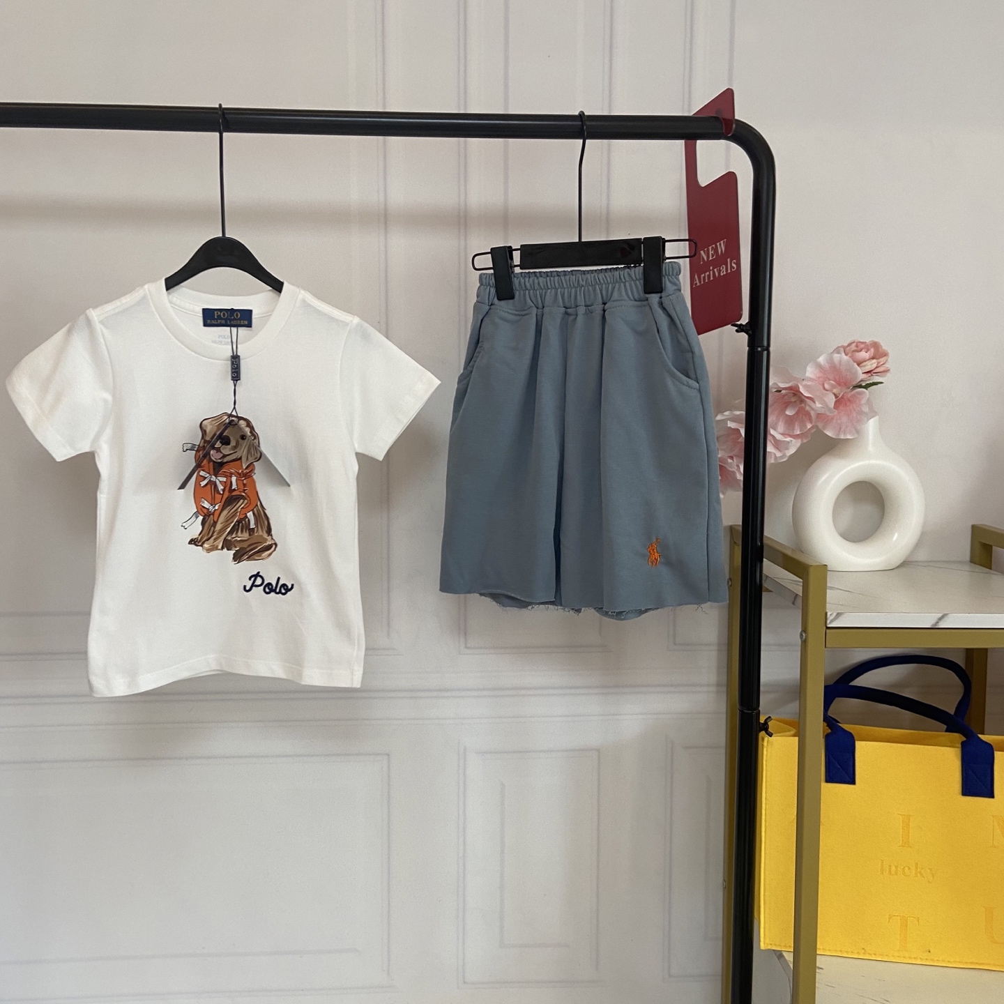 NO:769942,Kids' exclusive real-shot Polo bear short-sleeved suit top details. Classic and simple white T-shirt base, regardless of skin color, it looks super clean for both boys and girls. The front is printed with a super cute Polo bear pattern, the color is bright and does not fade, and the soft texture is super cute. It instantly transforms the baby into a street trendy person, making them turn heads when they go out!  Highlights of the bottoms: The haze blue shorts have a high-end feel, are gentle and refreshing, and are perfect for summer. The soft fabrics are selected to be skin-friendly, breathable and not sweaty. The trouser legs are exquisitely embroidered and full of details. The loose fit does not restrict activities, allowing you to run, jump and play freely. The raw edge trouser hem design adds a casual and trendy feel. Outfit & Reasons to Buy  Classic white and blue color scheme, casually paired with a pair of white shoes will give you a refreshing and youthful look in summer, suitable for school, travel, and daily wear. The high-quality fabric is washable and not easily deformed, and the elastic waist design fits the baby's body shape, making it easy to put on and take off. One set can complete your baby's summer outfits, without having to worry about matching, directly unlocking the high-looking look. Moms, hurry up and arrange this summer fashion for your baby!  Size 90--110-120-130-140-150cm, clothes, shorts, T-shirt, tees, t-shirt,19860909Kids独家实拍Polo小熊短袖套装 上衣细节 经典简约的白色T恤基底,不挑肤色,男宝女宝穿都超显干净.正面印着超萌的Polo小熊图案,色彩鲜亮不褪色,软乎乎的质感超讨喜,瞬间让娃变身街头小潮人,出街回头率拉满！ 下装亮点 雾霾蓝短裤自带高级感,温柔又清爽,超适合夏日.精选柔软面料,亲肤透气不闷汗,裤腿精致刺绣点缀,细节感满满.宽松版型不束缚活动,跑跳玩耍都自在,毛边裤脚设计更添随性潮流感. 穿搭&入手理由 经典白蓝配色,随便搭双小白鞋就是夏日清爽少年感,上学、出游、日常穿搭都适配.优质面料耐洗不易变形,松紧腰设计贴合宝宝身形,穿脱方便又舒适.一套搞定娃的夏日穿搭,不用费心搭配,直接解锁高颜值造型,宝妈们赶紧冲,给娃安排这份夏日时髦！ 码数90--110-120-130-140-150cm,衣服,shorts,T-shirt,tees，t-shirt,,Children's