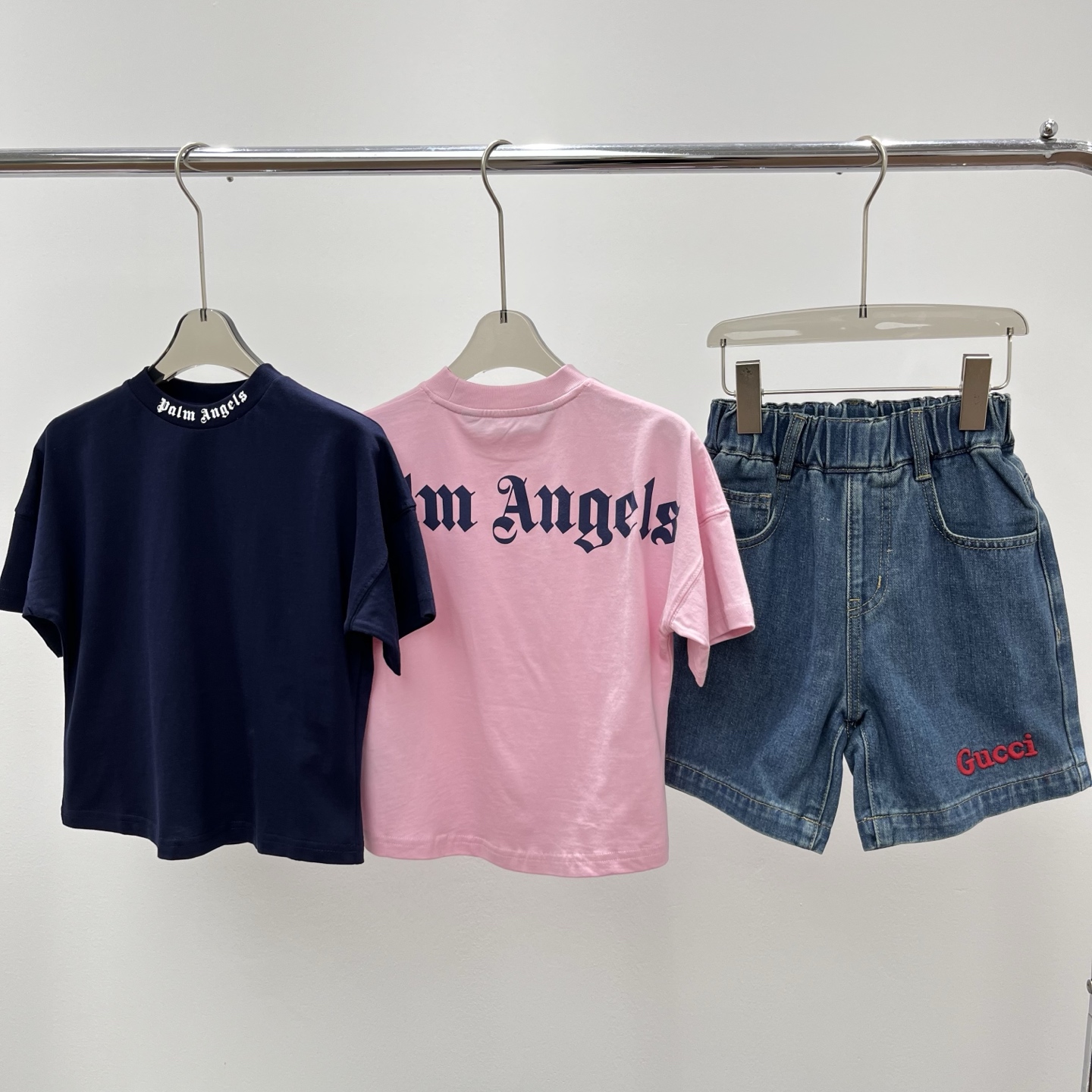 Camiseta de manga corta, pantalones cortos, marca de moda, camiseta holgada de manga corta con ángel de palma, diseño c…
