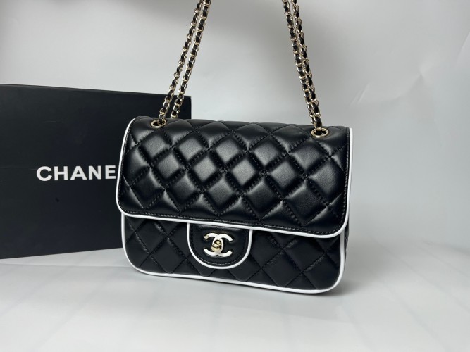 Elegant Chanel 25P Black & White Quilted Flap Bag with Ceramic CC Clasp 1 Elegant Chanel 25P Black & White Quilted Flap Bag with Ceramic CC Clasp