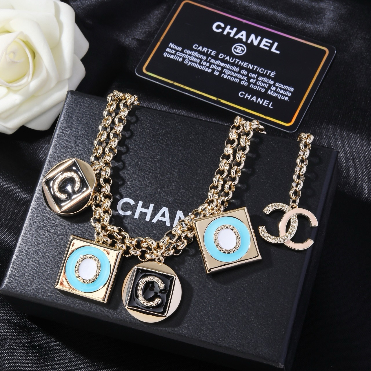 Chanel Coco Charms Double Chain necklace Light gold tone metal black enamel turquoise blue enamel white enamel clear crystal accents 80cm with 10cm extension
