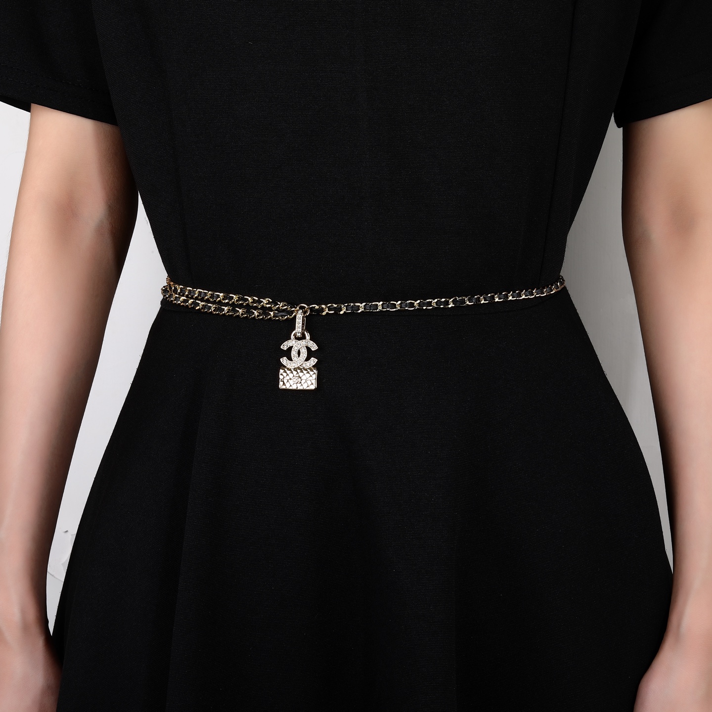 Chanel Goose series CC quilted bag charm chain necklace gold-tone metal with black leather inlay clear crystal accents 80cm