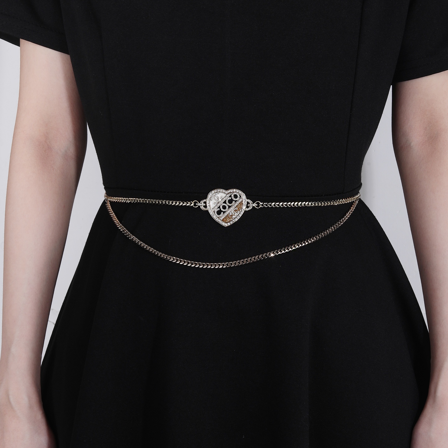 Chanel Coco Heart Waist Chain necklace Light gold tone metal with clear crystal and champagne glitter accents white enamel detail 80cm with 15cm extension